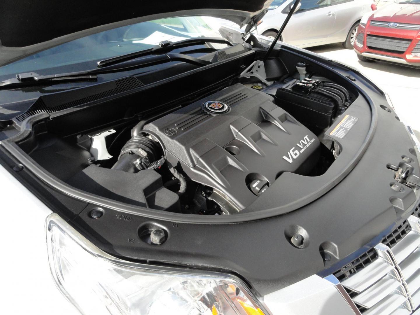 2015 Switchblade Silver Metallic /Jet Black Cadillac SRX-4 Performance Collection AWD (3GYFNFE34FS) with an 3.6L V6 DOHC 24V FFV engine, 6-Speed Automatic transmission, located at 827 W 26th Street, Erie, PA, 16508, (814) 455-3401, 42.105431, -80.090942 - Thanks for looking at our two-owner rust free like new trade in. This SUV just came back in on trade from a previous owner who trade it back in to us on a Cadillac XT5. This is the Performance model with all the options including all wheel drive, dual power heated front seats, remote start, a panora - Photo#40