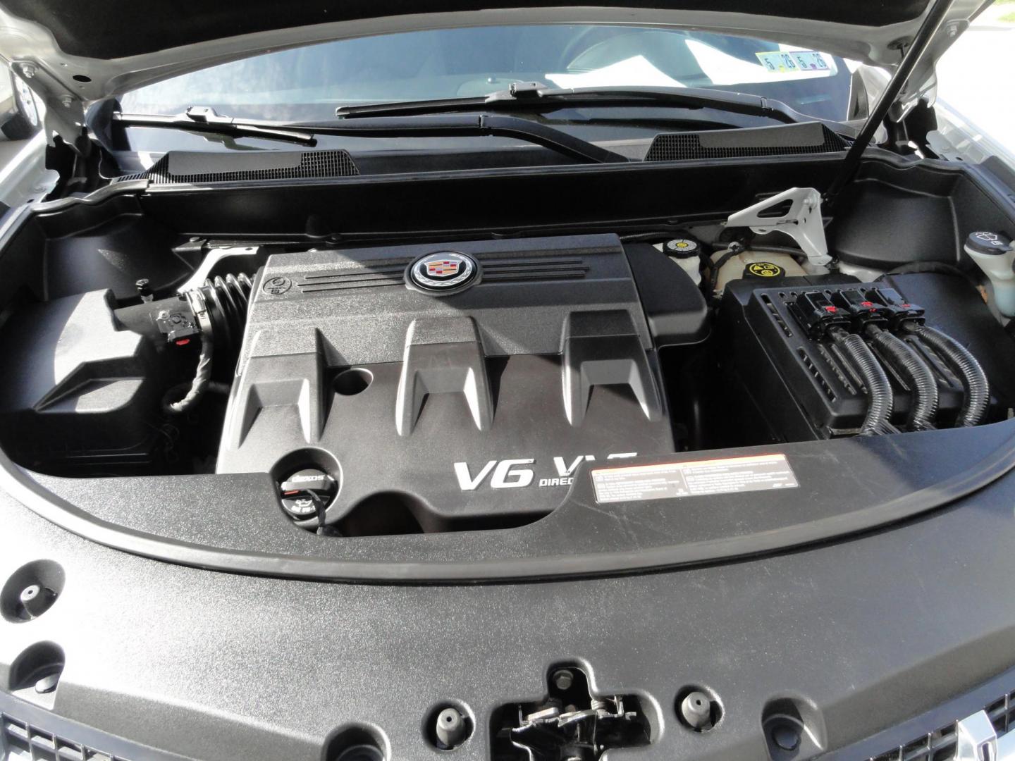 2015 Switchblade Silver Metallic /Jet Black Cadillac SRX-4 Performance Collection AWD (3GYFNFE34FS) with an 3.6L V6 DOHC 24V FFV engine, 6-Speed Automatic transmission, located at 827 W 26th Street, Erie, PA, 16508, (814) 455-3401, 42.105431, -80.090942 - Thanks for looking at our two-owner rust free like new trade in. This SUV just came back in on trade from a previous owner who trade it back in to us on a Cadillac XT5. This is the Performance model with all the options including all wheel drive, dual power heated front seats, remote start, a panora - Photo#41
