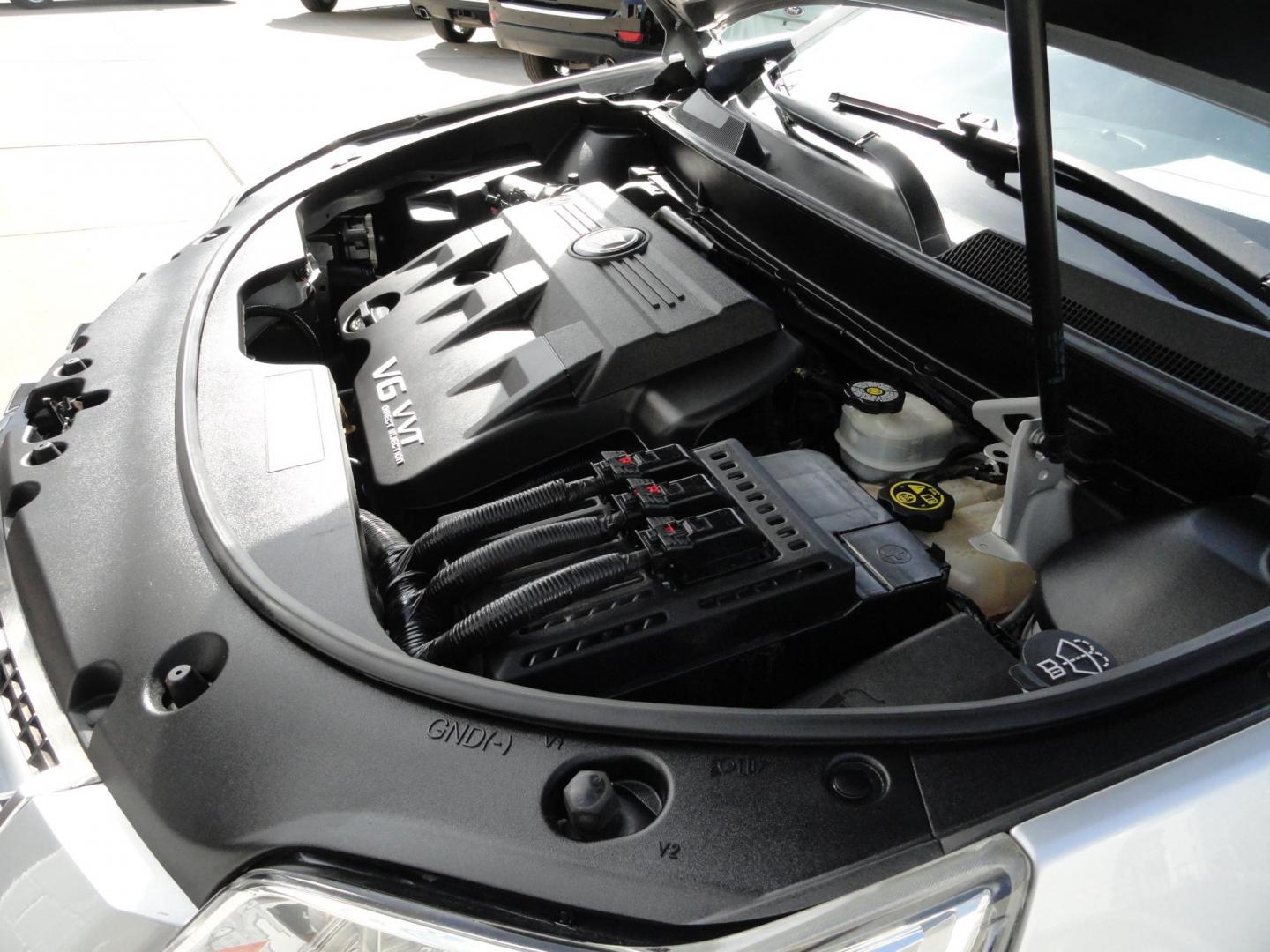 2015 Switchblade Silver Metallic /Jet Black Cadillac SRX-4 Performance Collection AWD (3GYFNFE34FS) with an 3.6L V6 DOHC 24V FFV engine, 6-Speed Automatic transmission, located at 827 W 26th Street, Erie, PA, 16508, (814) 455-3401, 42.105431, -80.090942 - Thanks for looking at our two-owner rust free like new trade in. This SUV just came back in on trade from a previous owner who trade it back in to us on a Cadillac XT5. This is the Performance model with all the options including all wheel drive, dual power heated front seats, remote start, a panora - Photo#42