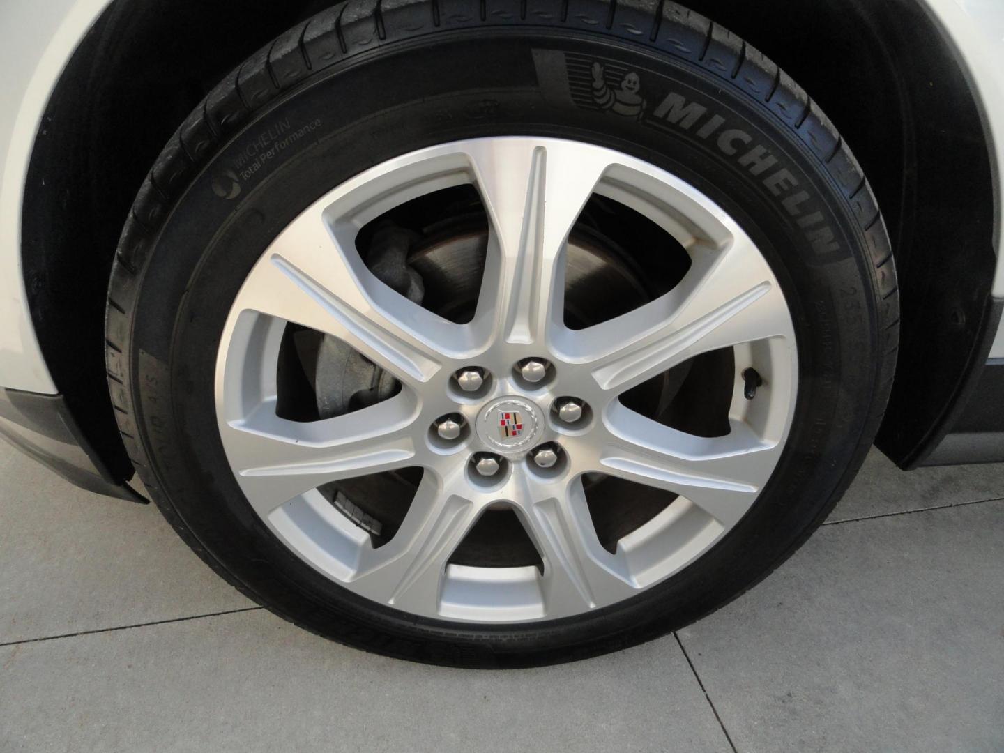 2015 Switchblade Silver Metallic /Jet Black Cadillac SRX-4 Performance Collection AWD (3GYFNFE34FS) with an 3.6L V6 DOHC 24V FFV engine, 6-Speed Automatic transmission, located at 827 W 26th Street, Erie, PA, 16508, (814) 455-3401, 42.105431, -80.090942 - Thanks for looking at our two-owner rust free like new trade in. This SUV just came back in on trade from a previous owner who trade it back in to us on a Cadillac XT5. This is the Performance model with all the options including all wheel drive, dual power heated front seats, remote start, a panora - Photo#44
