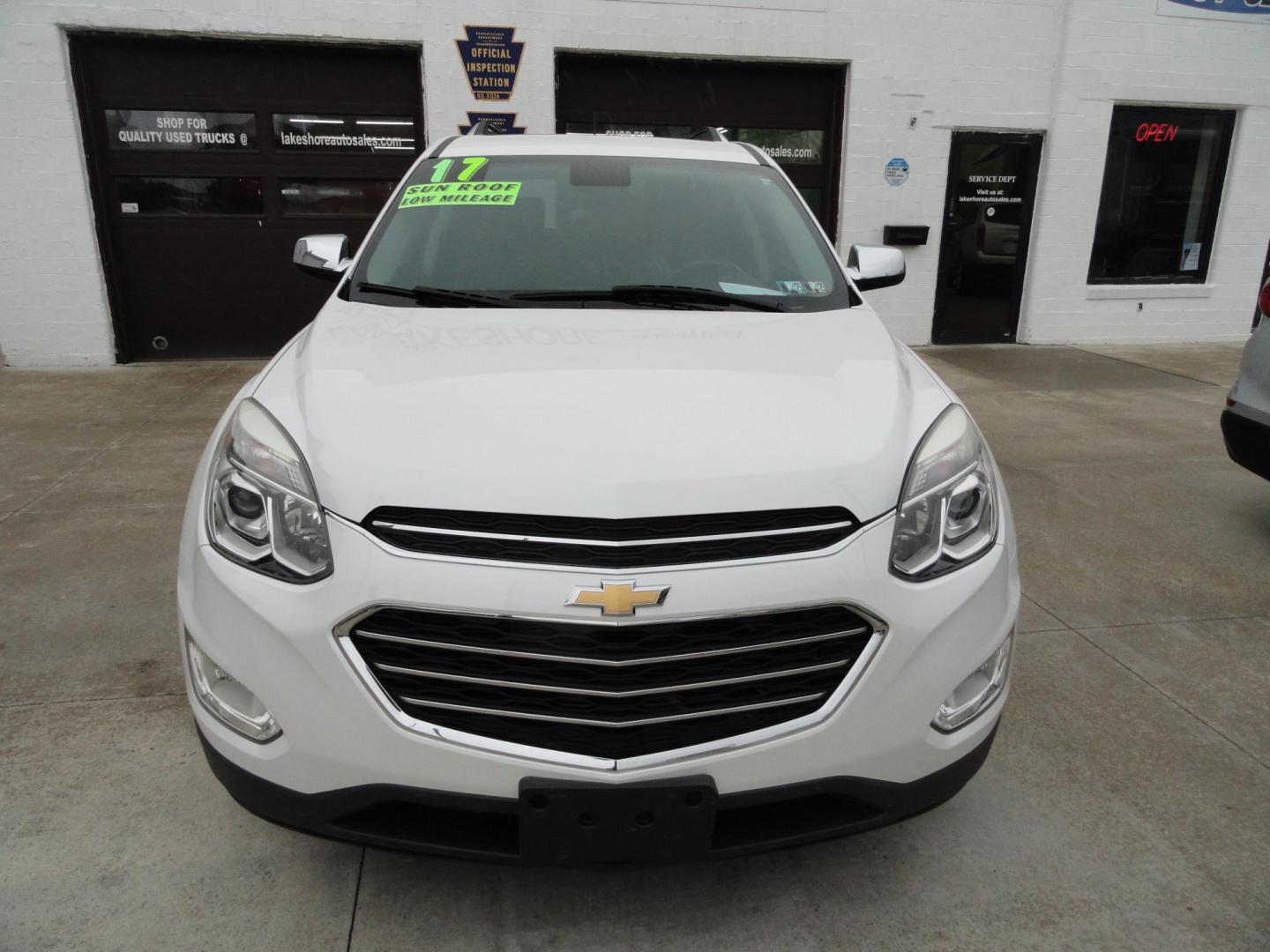 2017 Frost White Tricoat /Graphite Chevrolet Equinox Premier AWD (2GNFLGE34H6) with an 3.6L V6 DOHC 24V engine, 6 Automatic transmission, located at 827 W 26th Street, Erie, PA, 16508, (814) 455-3401, 42.105431, -80.090942 - Thanks for looking at our two-owner accident and rust-free new arrival. This SUV belongs to one of our owners and was his wife's driver for the last five years which explains the like new condition of the nonsmoker like new interior as well as the damage free exterior. This is the Premier model with - Photo#1