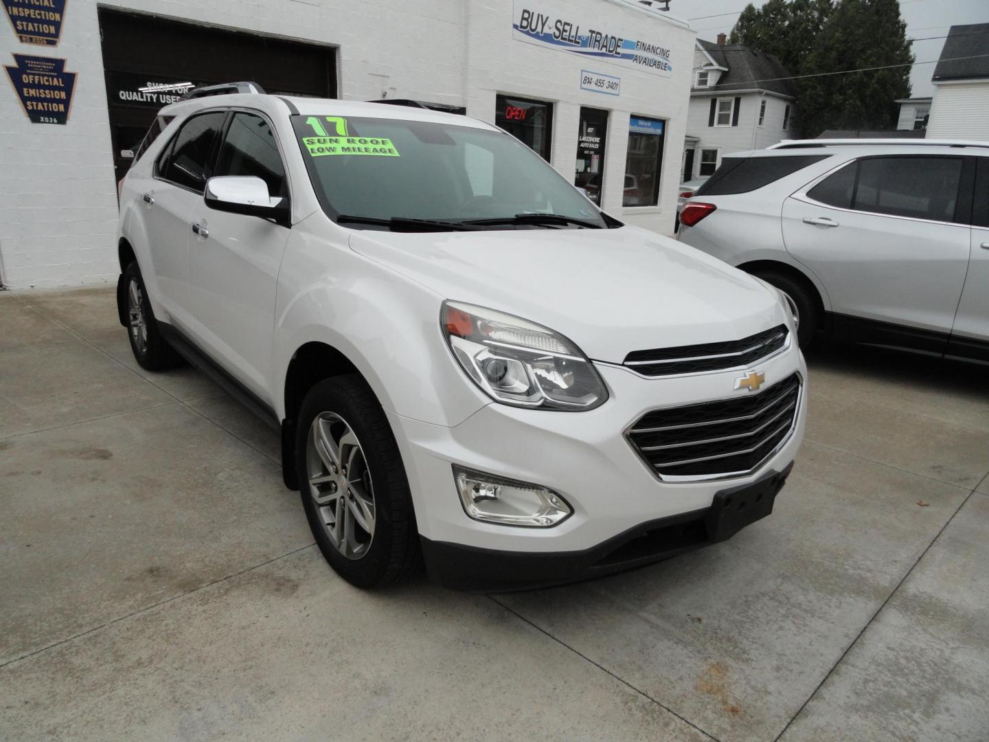 2017 Frost White Tricoat /Graphite Chevrolet Equinox Premier AWD (2GNFLGE34H6) with an 3.6L V6 DOHC 24V engine, 6 Automatic transmission, located at 827 W 26th Street, Erie, PA, 16508, (814) 455-3401, 42.105431, -80.090942 - Thanks for looking at our two-owner accident and rust-free new arrival. This SUV belongs to one of our owners and was his wife's driver for the last five years which explains the like new condition of the nonsmoker like new interior as well as the damage free exterior. This is the Premier model with - Photo#0