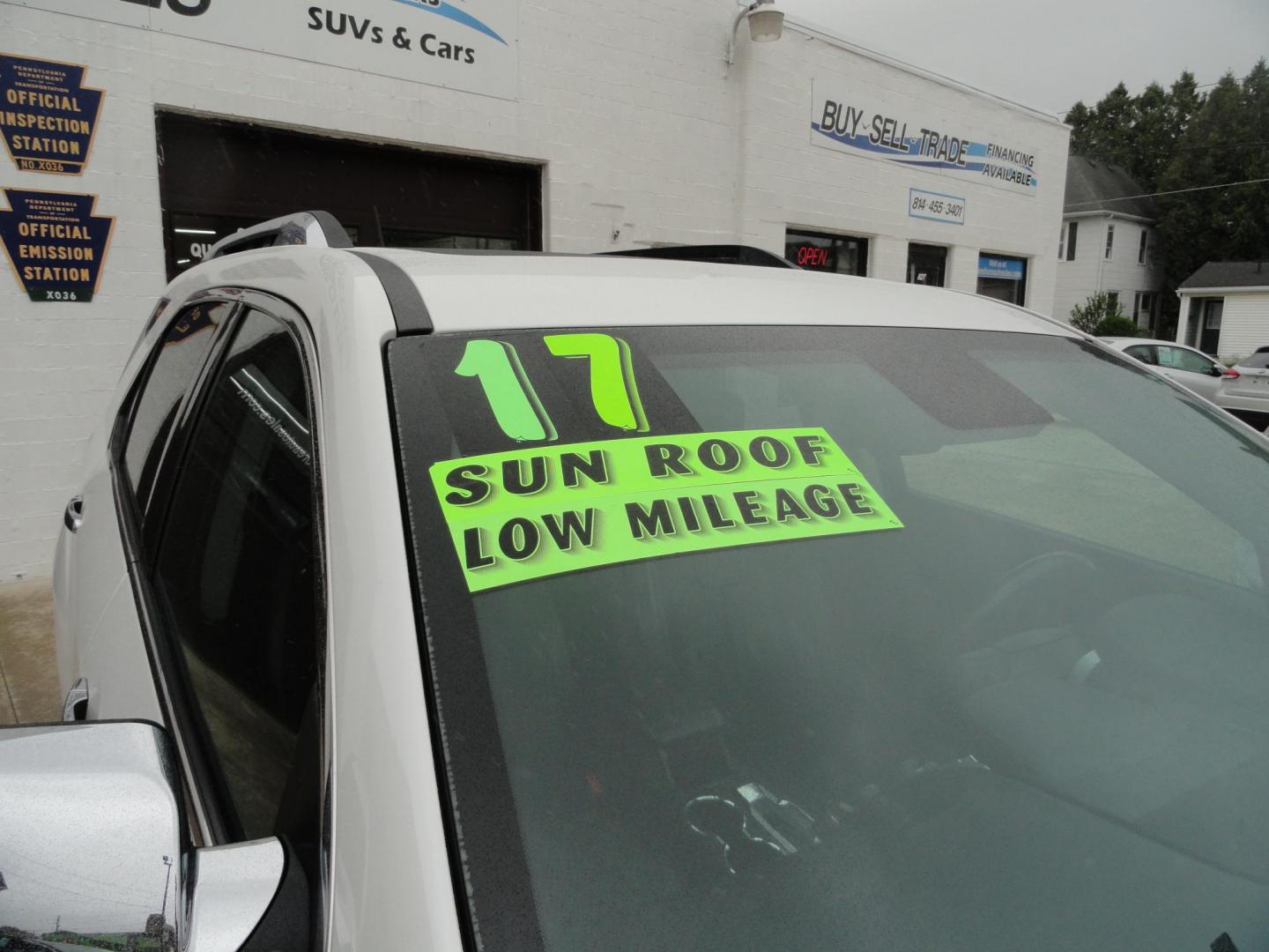 2017 Frost White Tricoat /Graphite Chevrolet Equinox Premier AWD (2GNFLGE34H6) with an 3.6L V6 DOHC 24V engine, 6 Automatic transmission, located at 827 W 26th Street, Erie, PA, 16508, (814) 455-3401, 42.105431, -80.090942 - Thanks for looking at our two-owner accident and rust-free new arrival. This SUV belongs to one of our owners and was his wife's driver for the last five years which explains the like new condition of the nonsmoker like new interior as well as the damage free exterior. This is the Premier model with - Photo#2