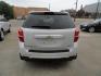 2017 Frost White Tricoat /Graphite Chevrolet Equinox Premier AWD (2GNFLGE34H6) with an 3.6L V6 DOHC 24V engine, 6 Automatic transmission, located at 827 W 26th Street, Erie, PA, 16508, (814) 455-3401, 42.105431, -80.090942 - Thanks for looking at our two-owner accident and rust-free new arrival. This SUV belongs to one of our owners and was his wife's driver for the last five years which explains the like new condition of the nonsmoker like new interior as well as the damage free exterior. This is the Premier model with - Photo#4