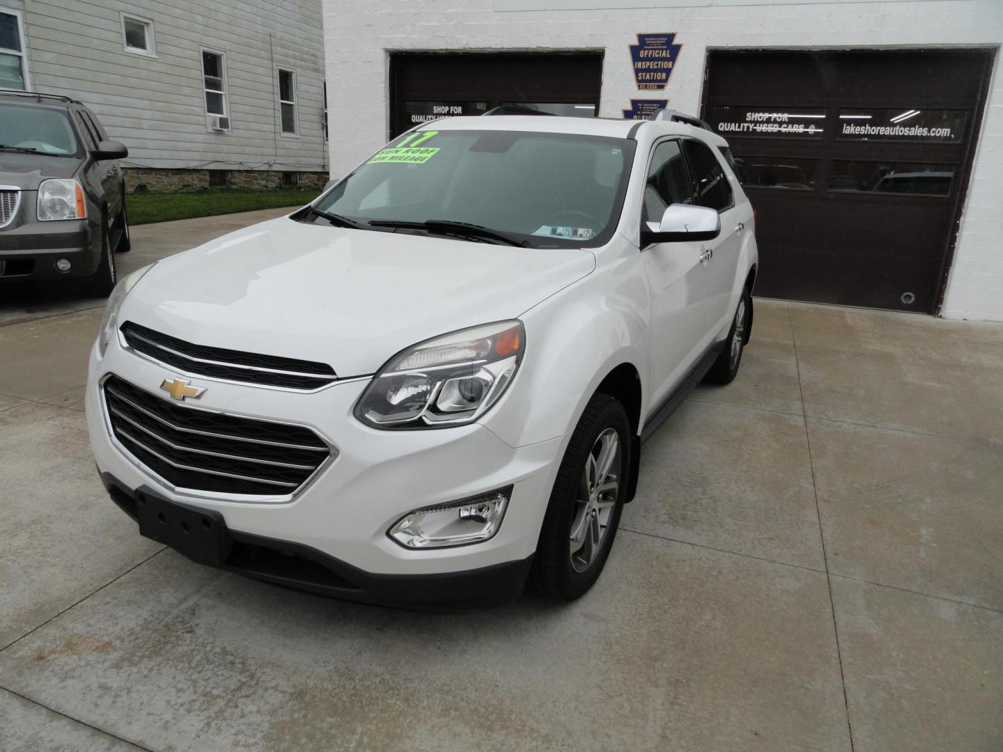 2017 Frost White Tricoat /Graphite Chevrolet Equinox Premier AWD (2GNFLGE34H6) with an 3.6L V6 DOHC 24V engine, 6 Automatic transmission, located at 827 W 26th Street, Erie, PA, 16508, (814) 455-3401, 42.105431, -80.090942 - Thanks for looking at our two-owner accident and rust-free new arrival. This SUV belongs to one of our owners and was his wife's driver for the last five years which explains the like new condition of the nonsmoker like new interior as well as the damage free exterior. This is the Premier model with - Photo#7