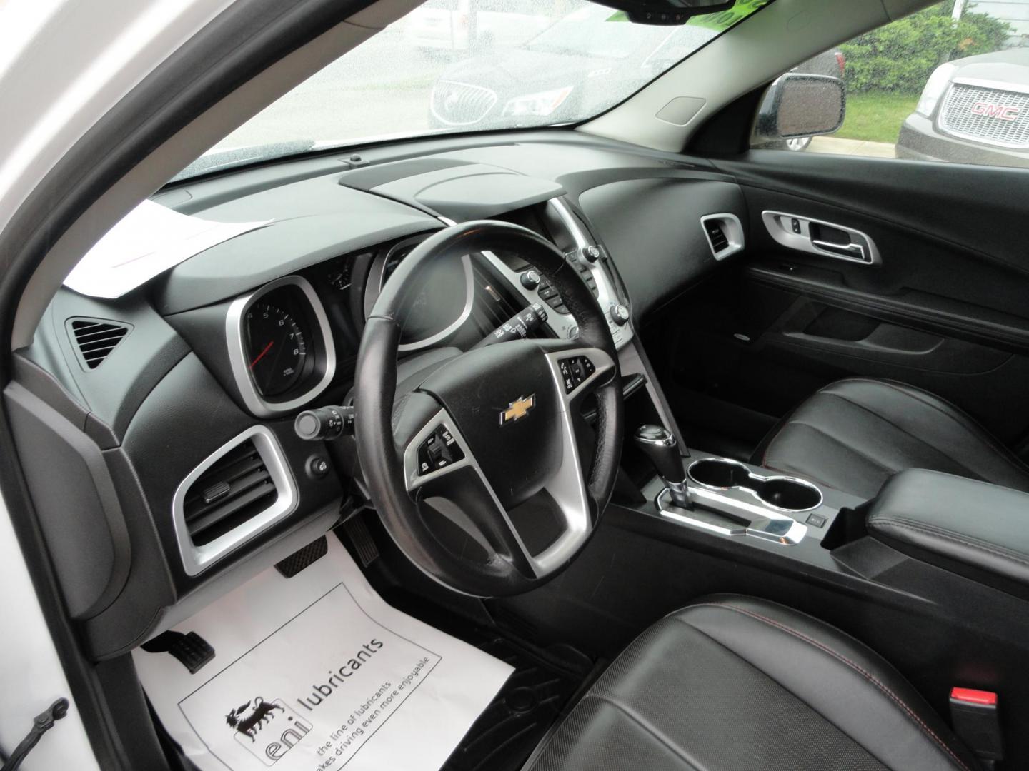 2017 Frost White Tricoat /Graphite Chevrolet Equinox Premier AWD (2GNFLGE34H6) with an 3.6L V6 DOHC 24V engine, 6 Automatic transmission, located at 827 W 26th Street, Erie, PA, 16508, (814) 455-3401, 42.105431, -80.090942 - Thanks for looking at our two-owner accident and rust-free new arrival. This SUV belongs to one of our owners and was his wife's driver for the last five years which explains the like new condition of the nonsmoker like new interior as well as the damage free exterior. This is the Premier model with - Photo#22