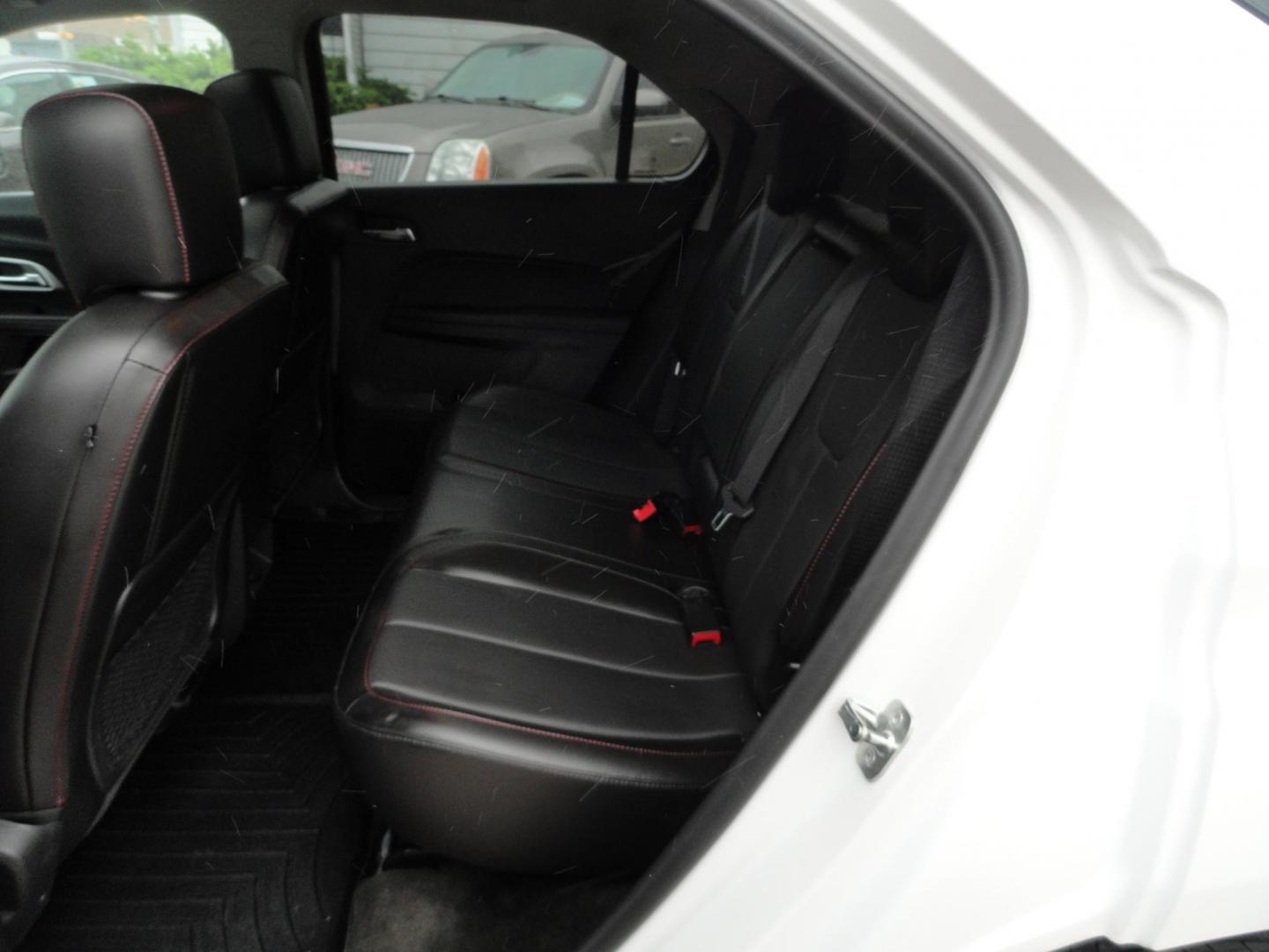 2017 Frost White Tricoat /Graphite Chevrolet Equinox Premier AWD (2GNFLGE34H6) with an 3.6L V6 DOHC 24V engine, 6 Automatic transmission, located at 827 W 26th Street, Erie, PA, 16508, (814) 455-3401, 42.105431, -80.090942 - Thanks for looking at our two-owner accident and rust-free new arrival. This SUV belongs to one of our owners and was his wife's driver for the last five years which explains the like new condition of the nonsmoker like new interior as well as the damage free exterior. This is the Premier model with - Photo#29