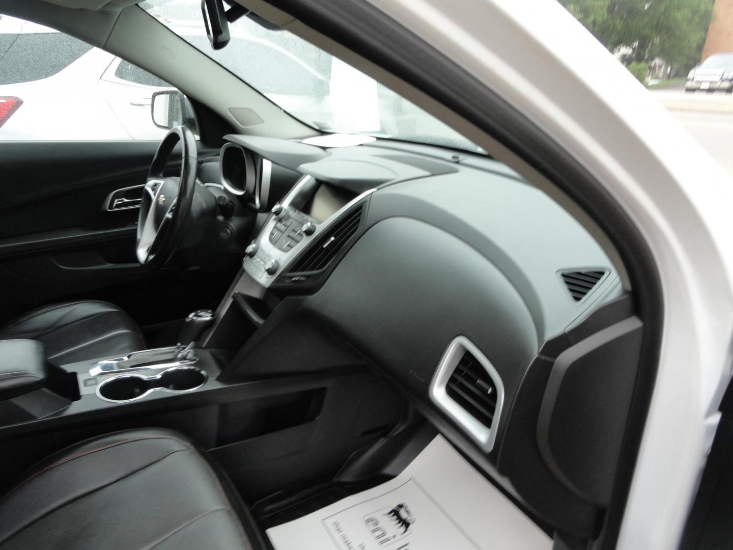 2017 Frost White Tricoat /Graphite Chevrolet Equinox Premier AWD (2GNFLGE34H6) with an 3.6L V6 DOHC 24V engine, 6 Automatic transmission, located at 827 W 26th Street, Erie, PA, 16508, (814) 455-3401, 42.105431, -80.090942 - Thanks for looking at our two-owner accident and rust-free new arrival. This SUV belongs to one of our owners and was his wife's driver for the last five years which explains the like new condition of the nonsmoker like new interior as well as the damage free exterior. This is the Premier model with - Photo#38