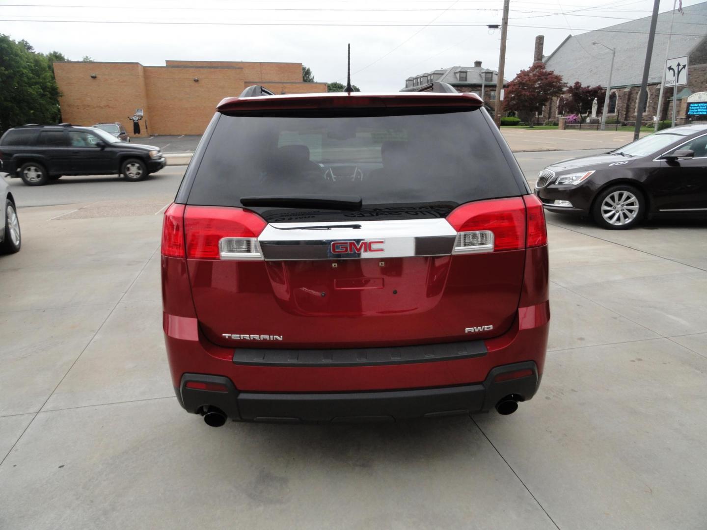 2014 Crystal Claret Tricoat /Graphite GMC Terrain SLT1 AWD (2GKFLXE32E6) with an 3.6L V6 DOHC 24V engine, 6-Speed Automatic transmission, located at 827 W 26th Street, Erie, PA, 16508, (814) 455-3401, 42.105431, -80.090942 - Thanks for looking at our two-owner low mileage accident and rust-free new arrival. This is the SLT model with the 3.6L V6 DOHC 24 Valve V-6, all-wheel drive, a power heated front drivers seat, leather seating, power sunroof, power lift gate, factory remote start, rear camera Bluetooth, both keys an - Photo#4