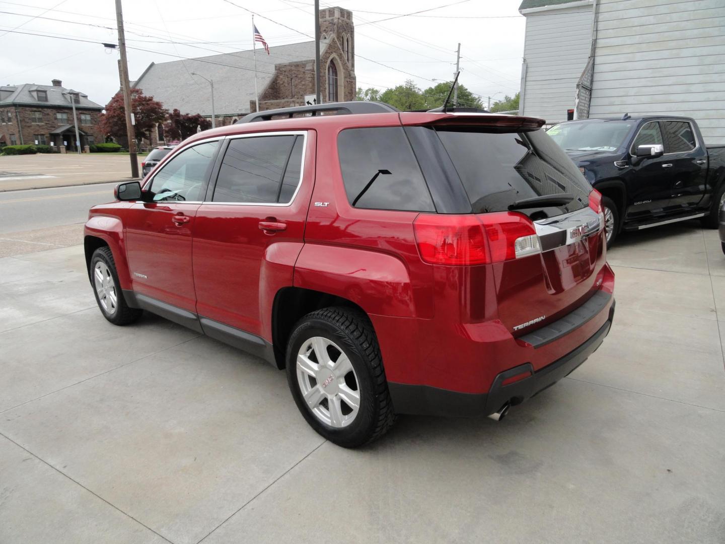 2014 Crystal Claret Tricoat /Graphite GMC Terrain SLT1 AWD (2GKFLXE32E6) with an 3.6L V6 DOHC 24V engine, 6-Speed Automatic transmission, located at 827 W 26th Street, Erie, PA, 16508, (814) 455-3401, 42.105431, -80.090942 - Thanks for looking at our two-owner low mileage accident and rust-free new arrival. This is the SLT model with the 3.6L V6 DOHC 24 Valve V-6, all-wheel drive, a power heated front drivers seat, leather seating, power sunroof, power lift gate, factory remote start, rear camera Bluetooth, both keys an - Photo#5