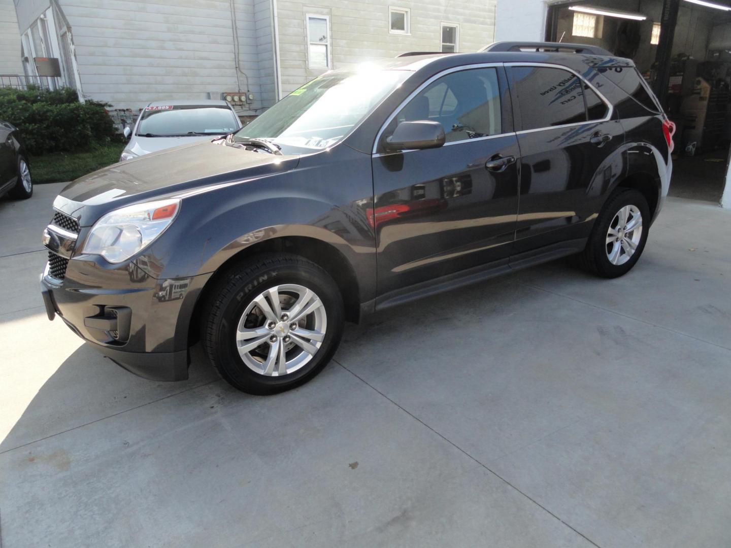 2015 Tungsten Metallic /Greystone Chevrolet Equinox 1LT AWD (2GNFLFEK7F6) with an 2.4L L4 DOHC 16V FFV engine, 6-Speed Automatic transmission, located at 827 W 26th Street, Erie, PA, 16508, (814) 455-3401, 42.105431, -80.090942 - Thanks for looking at our low mileage accident-free new Chevy trade in. This is the LT model with all wheel drive, power drivers seat, back up camera, Bluetooth and lots more. A full service was just completed in our service department with new Pa state and emissions inspection plus a lube oil and f - Photo#6