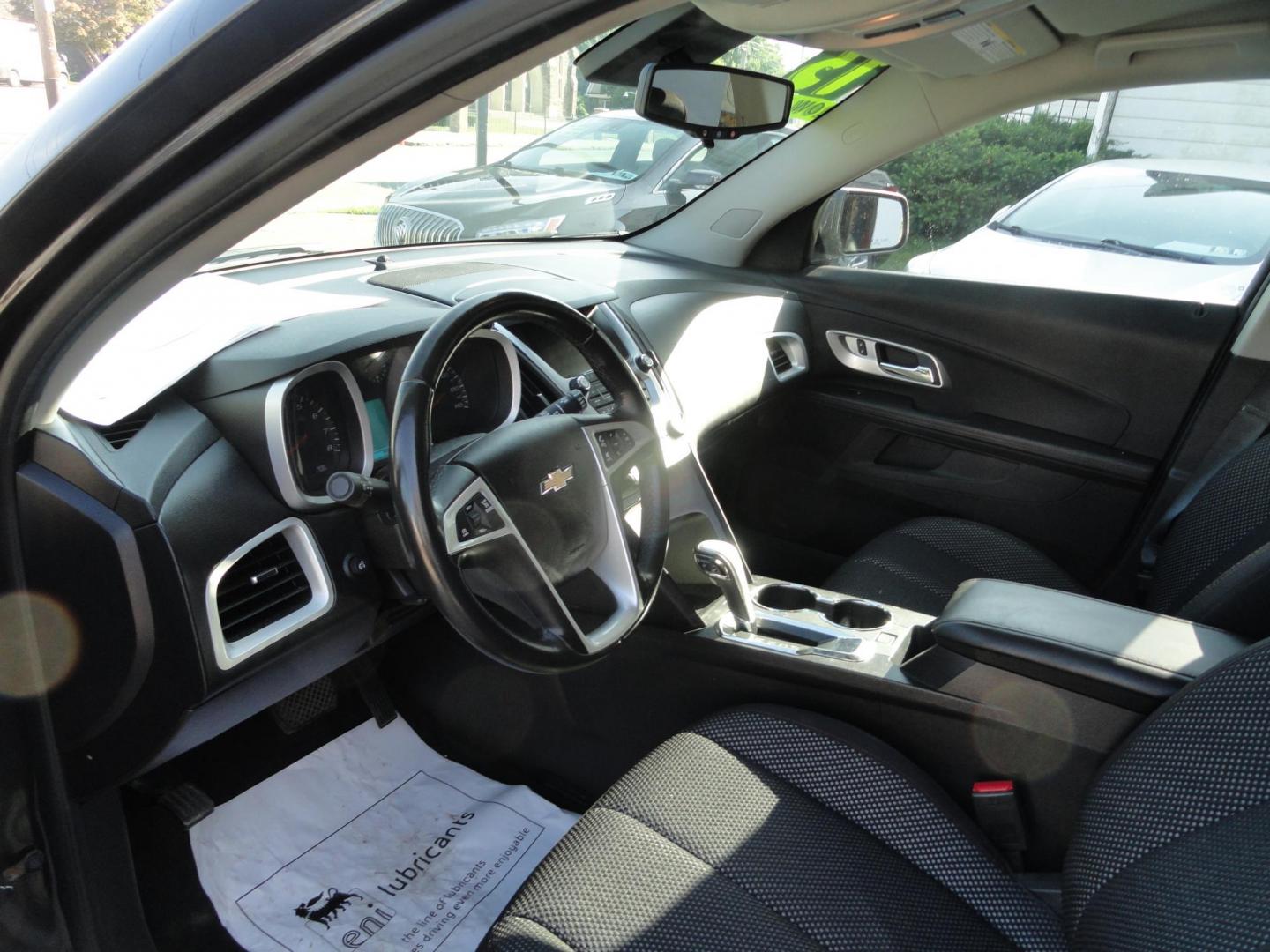2015 Tungsten Metallic /Greystone Chevrolet Equinox 1LT AWD (2GNFLFEK7F6) with an 2.4L L4 DOHC 16V FFV engine, 6-Speed Automatic transmission, located at 827 W 26th Street, Erie, PA, 16508, (814) 455-3401, 42.105431, -80.090942 - Thanks for looking at our low mileage accident-free new Chevy trade in. This is the LT model with all wheel drive, power drivers seat, back up camera, Bluetooth and lots more. A full service was just completed in our service department with new Pa state and emissions inspection plus a lube oil and f - Photo#9