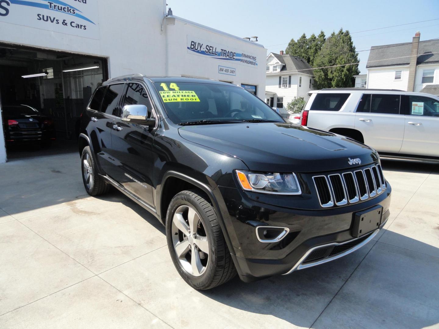2014 Brillant Black Crystal /Jet Black Jeep Grand Cherokee Limited 4WD (1C4RJFBG7EC) with an 3.6L V6 DOHC 24V engine, 5-Speed Automatic transmission, located at 827 W 26th Street, Erie, PA, 16508, (814) 455-3401, 42.105431, -80.090942 - Thanks for looking at our low mileage rust free new Jeep trade. This is the Limited model with all wheel drive, power sunroof, power lift gate, power drivers seat, remote start, heated front and second row seats, navigation, blind spot monitor, upgrade wheels and lots more. A full service was just c - Photo#0