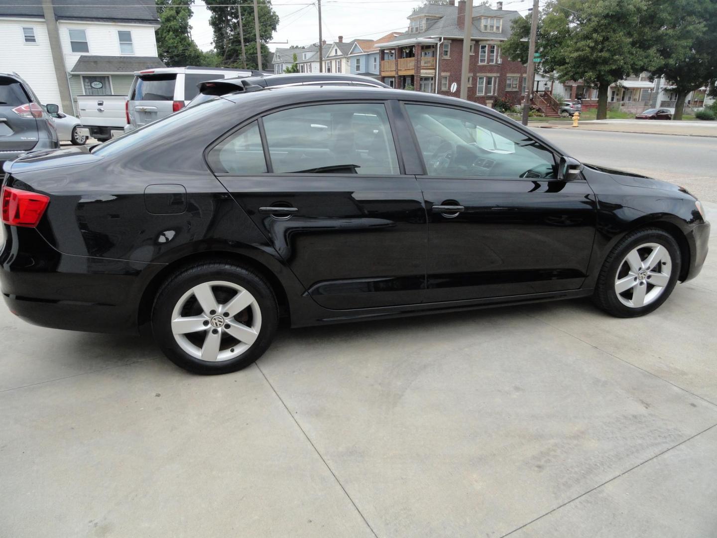 2012 Super Black /Greystone Volkswagen Jetta TDI (3VWLL7AJ2CM) with an 2.0L L4 DOHC 16V TURBO engine, 6-Speed Automatic transmission, located at 827 W 26th Street, Erie, PA, 16508, (814) 455-3401, 42.105431, -80.090942 - Thanks for looking at our two-owner accident and rust-free recent trade in. This is the TDI model which means diesel, leather seating area, heated front seats, keyless entry with both remotes, the factory owners manuals, Weathertech floor mats and lots more. This was a well-kept vehicle by its last - Photo#2