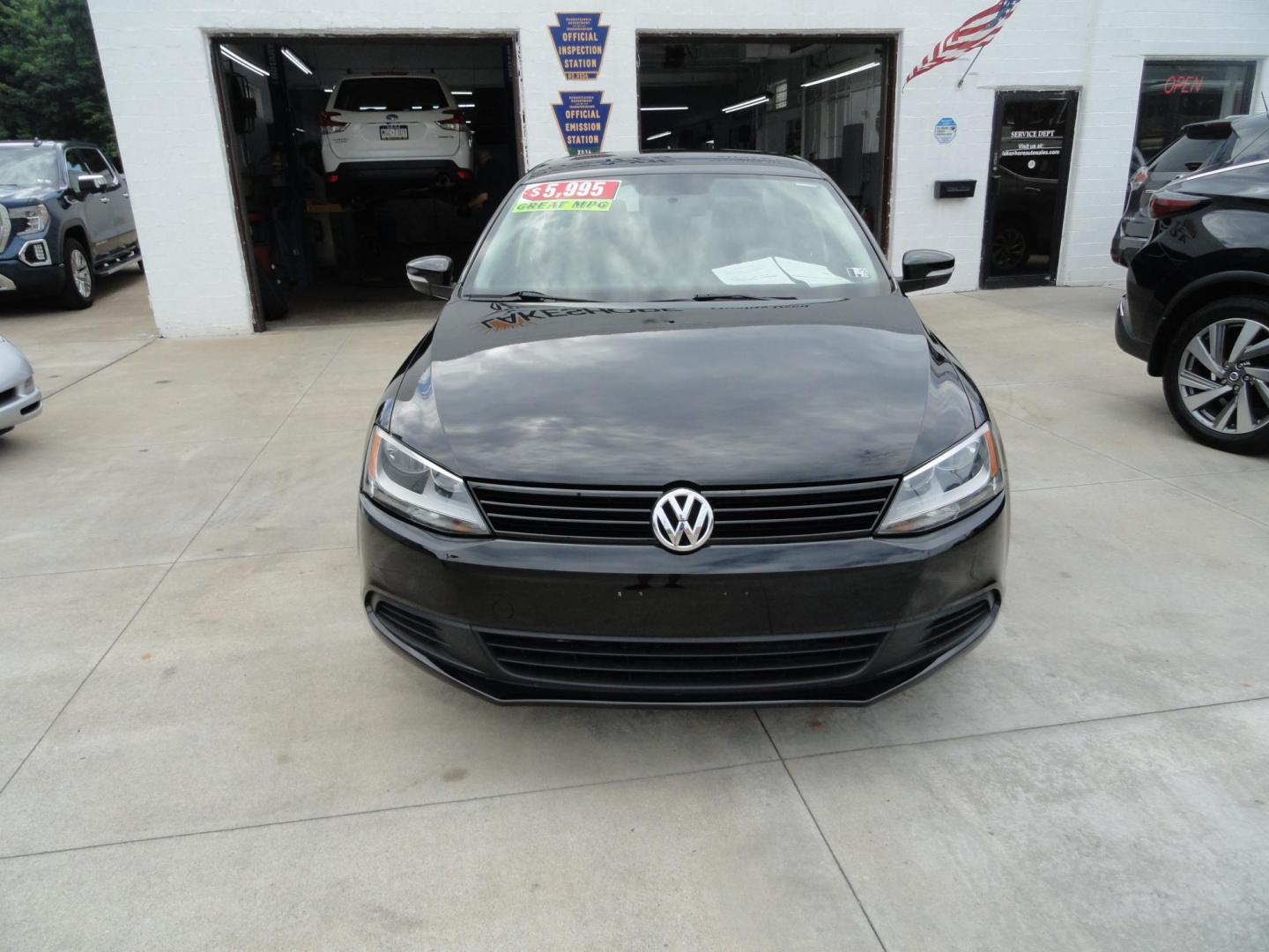 2012 Super Black /Greystone Volkswagen Jetta TDI (3VWLL7AJ2CM) with an 2.0L L4 DOHC 16V TURBO engine, 6-Speed Automatic transmission, located at 827 W 26th Street, Erie, PA, 16508, (814) 455-3401, 42.105431, -80.090942 - Thanks for looking at our two-owner accident and rust-free recent trade in. This is the TDI model which means diesel, leather seating area, heated front seats, keyless entry with both remotes, the factory owners manuals, Weathertech floor mats and lots more. This was a well-kept vehicle by its last - Photo#1