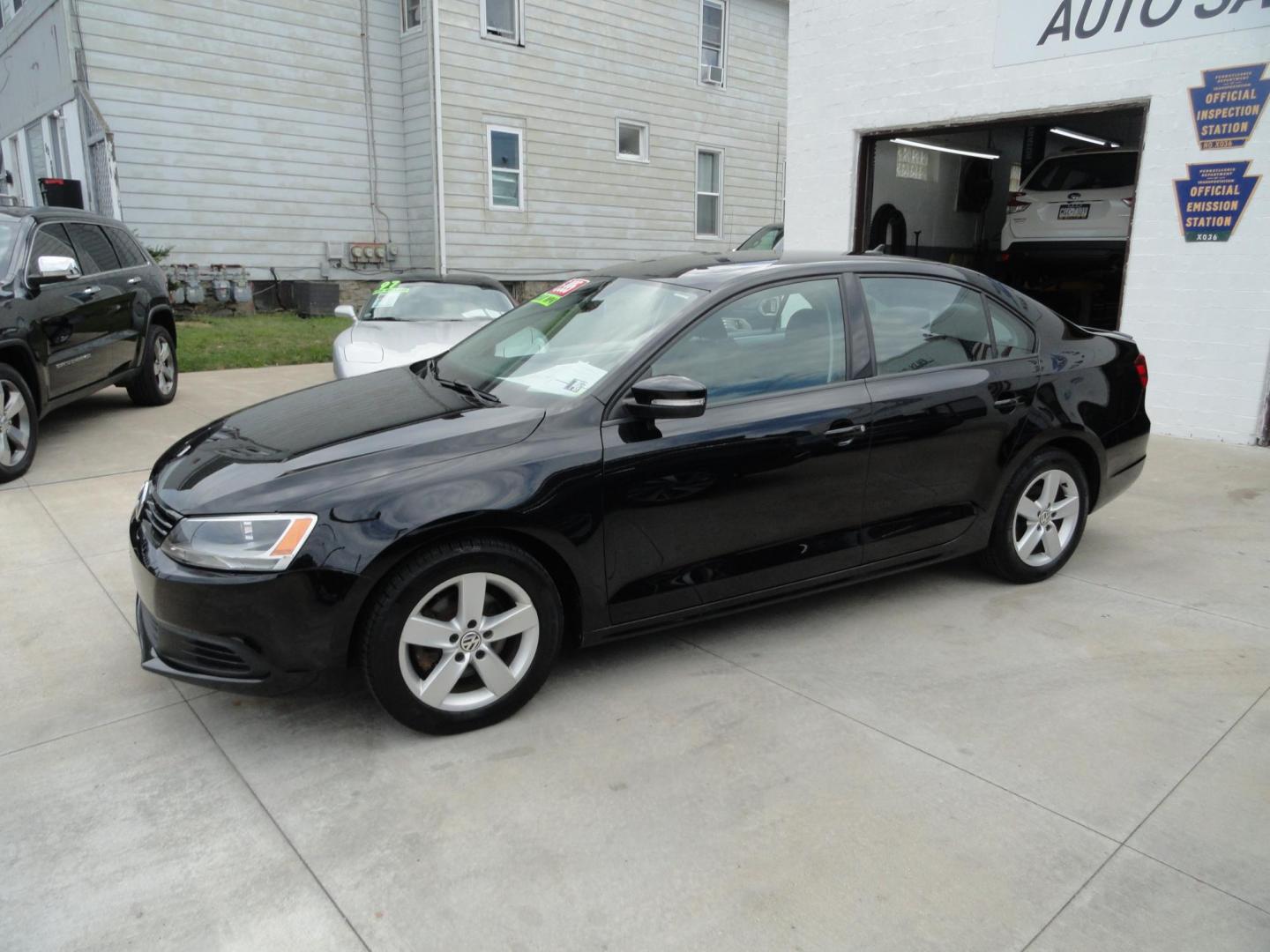 2012 Super Black /Greystone Volkswagen Jetta TDI (3VWLL7AJ2CM) with an 2.0L L4 DOHC 16V TURBO engine, 6-Speed Automatic transmission, located at 827 W 26th Street, Erie, PA, 16508, (814) 455-3401, 42.105431, -80.090942 - Thanks for looking at our two-owner accident and rust-free recent trade in. This is the TDI model which means diesel, leather seating area, heated front seats, keyless entry with both remotes, the factory owners manuals, Weathertech floor mats and lots more. This was a well-kept vehicle by its last - Photo#5