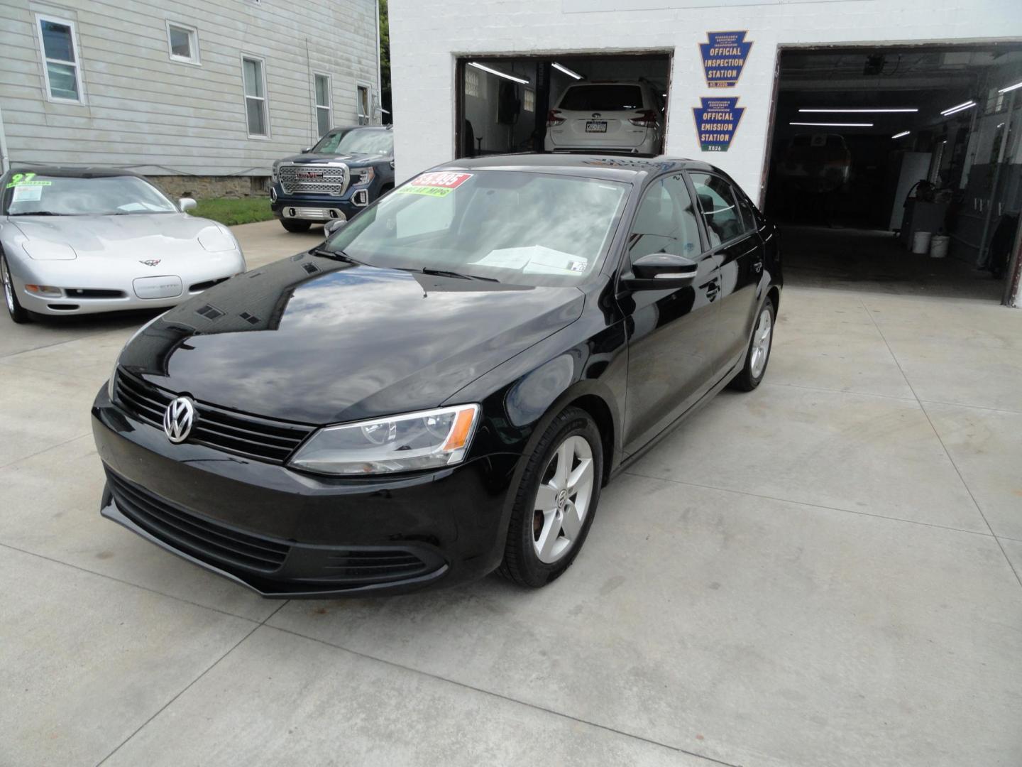2012 Super Black /Greystone Volkswagen Jetta TDI (3VWLL7AJ2CM) with an 2.0L L4 DOHC 16V TURBO engine, 6-Speed Automatic transmission, located at 827 W 26th Street, Erie, PA, 16508, (814) 455-3401, 42.105431, -80.090942 - Thanks for looking at our two-owner accident and rust-free recent trade in. This is the TDI model which means diesel, leather seating area, heated front seats, keyless entry with both remotes, the factory owners manuals, Weathertech floor mats and lots more. This was a well-kept vehicle by its last - Photo#6