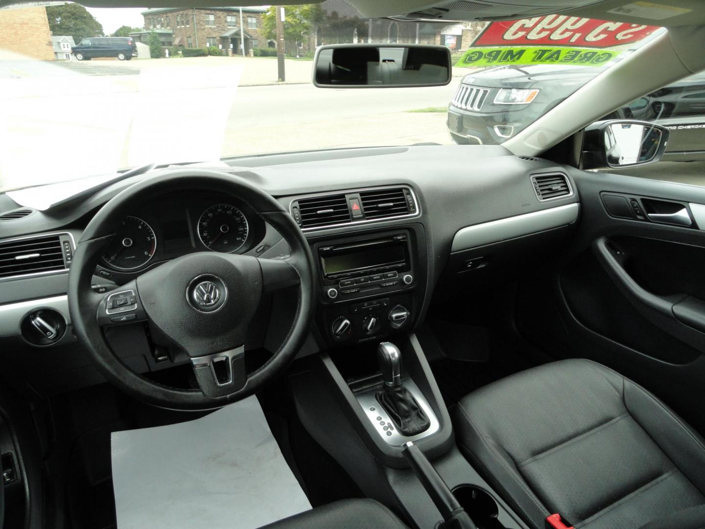2012 Super Black /Greystone Volkswagen Jetta TDI (3VWLL7AJ2CM) with an 2.0L L4 DOHC 16V TURBO engine, 6-Speed Automatic transmission, located at 827 W 26th Street, Erie, PA, 16508, (814) 455-3401, 42.105431, -80.090942 - Thanks for looking at our two-owner accident and rust-free recent trade in. This is the TDI model which means diesel, leather seating area, heated front seats, keyless entry with both remotes, the factory owners manuals, Weathertech floor mats and lots more. This was a well-kept vehicle by its last - Photo#7