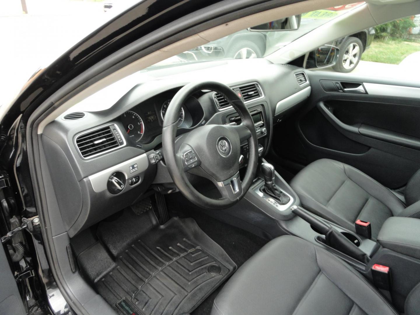 2012 Super Black /Greystone Volkswagen Jetta TDI (3VWLL7AJ2CM) with an 2.0L L4 DOHC 16V TURBO engine, 6-Speed Automatic transmission, located at 827 W 26th Street, Erie, PA, 16508, (814) 455-3401, 42.105431, -80.090942 - Thanks for looking at our two-owner accident and rust-free recent trade in. This is the TDI model which means diesel, leather seating area, heated front seats, keyless entry with both remotes, the factory owners manuals, Weathertech floor mats and lots more. This was a well-kept vehicle by its last - Photo#8