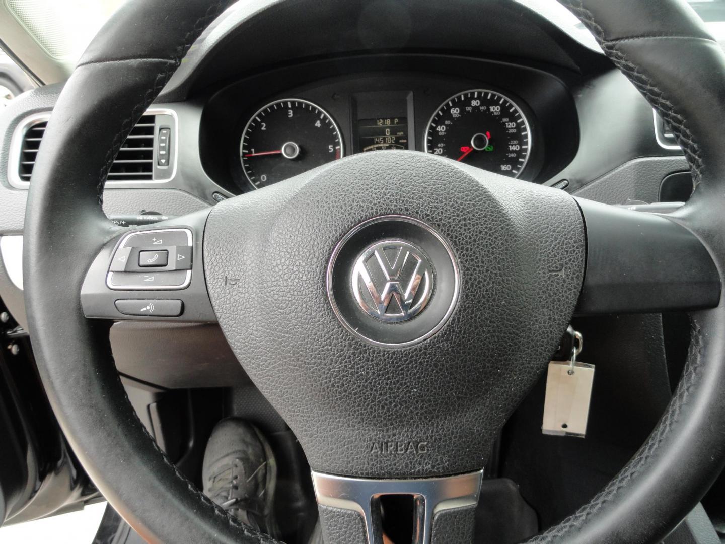 2012 Super Black /Greystone Volkswagen Jetta TDI (3VWLL7AJ2CM) with an 2.0L L4 DOHC 16V TURBO engine, 6-Speed Automatic transmission, located at 827 W 26th Street, Erie, PA, 16508, (814) 455-3401, 42.105431, -80.090942 - Thanks for looking at our two-owner accident and rust-free recent trade in. This is the TDI model which means diesel, leather seating area, heated front seats, keyless entry with both remotes, the factory owners manuals, Weathertech floor mats and lots more. This was a well-kept vehicle by its last - Photo#13