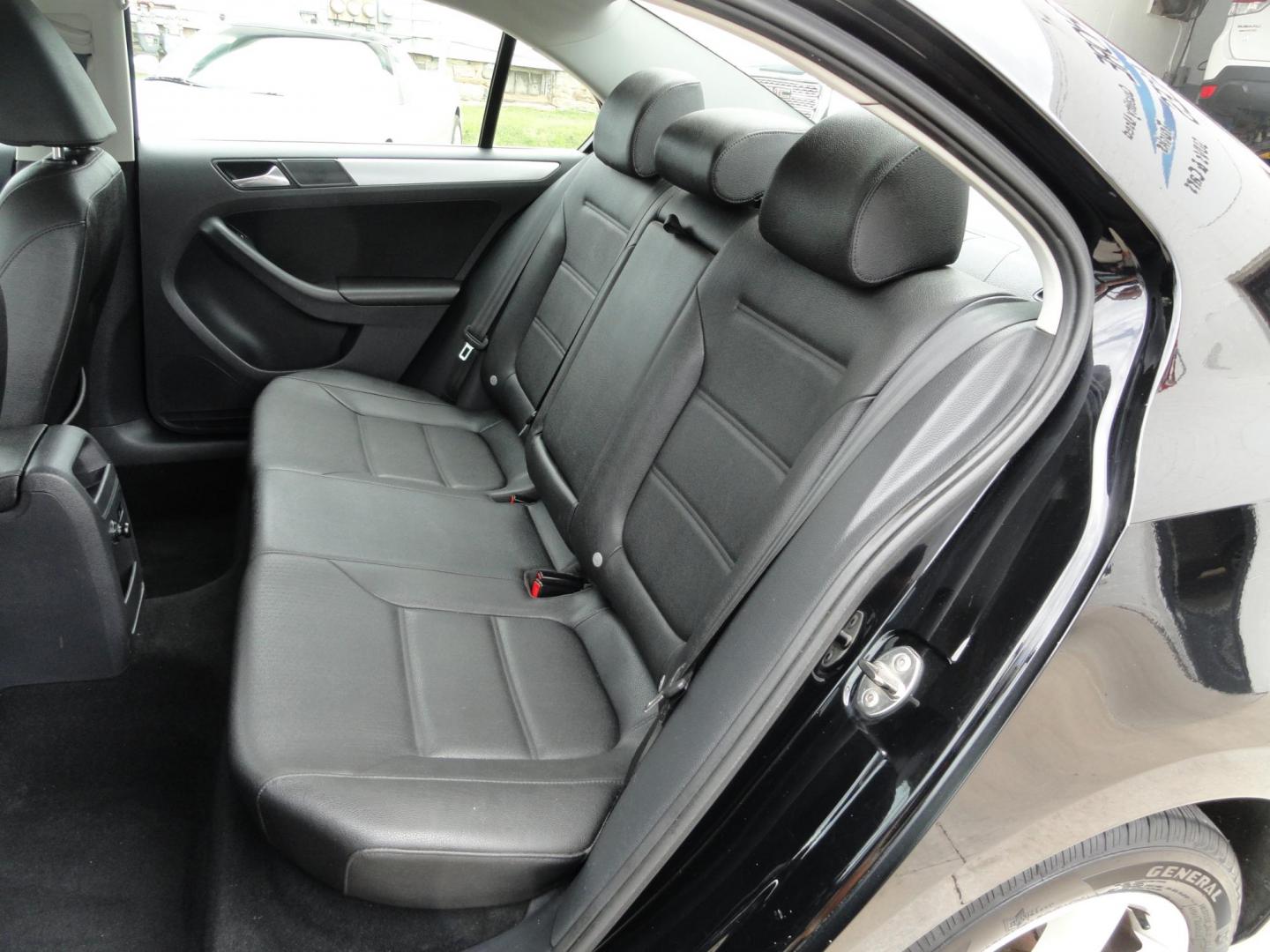 2012 Super Black /Greystone Volkswagen Jetta TDI (3VWLL7AJ2CM) with an 2.0L L4 DOHC 16V TURBO engine, 6-Speed Automatic transmission, located at 827 W 26th Street, Erie, PA, 16508, (814) 455-3401, 42.105431, -80.090942 - Thanks for looking at our two-owner accident and rust-free recent trade in. This is the TDI model which means diesel, leather seating area, heated front seats, keyless entry with both remotes, the factory owners manuals, Weathertech floor mats and lots more. This was a well-kept vehicle by its last - Photo#21