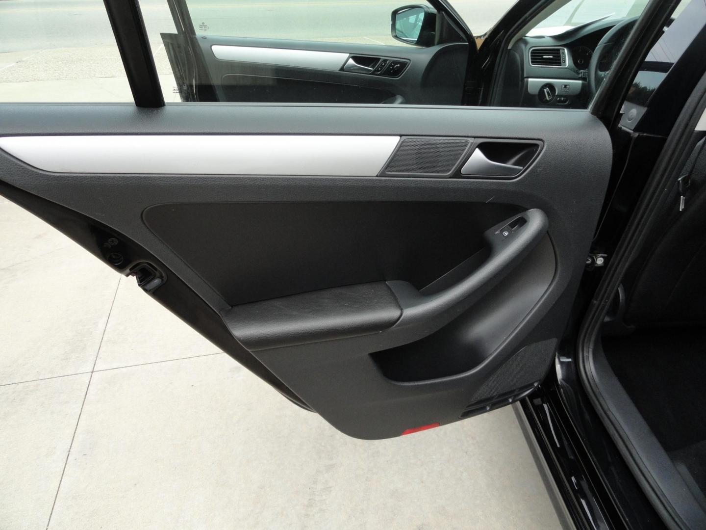 2012 Super Black /Greystone Volkswagen Jetta TDI (3VWLL7AJ2CM) with an 2.0L L4 DOHC 16V TURBO engine, 6-Speed Automatic transmission, located at 827 W 26th Street, Erie, PA, 16508, (814) 455-3401, 42.105431, -80.090942 - Thanks for looking at our two-owner accident and rust-free recent trade in. This is the TDI model which means diesel, leather seating area, heated front seats, keyless entry with both remotes, the factory owners manuals, Weathertech floor mats and lots more. This was a well-kept vehicle by its last - Photo#24