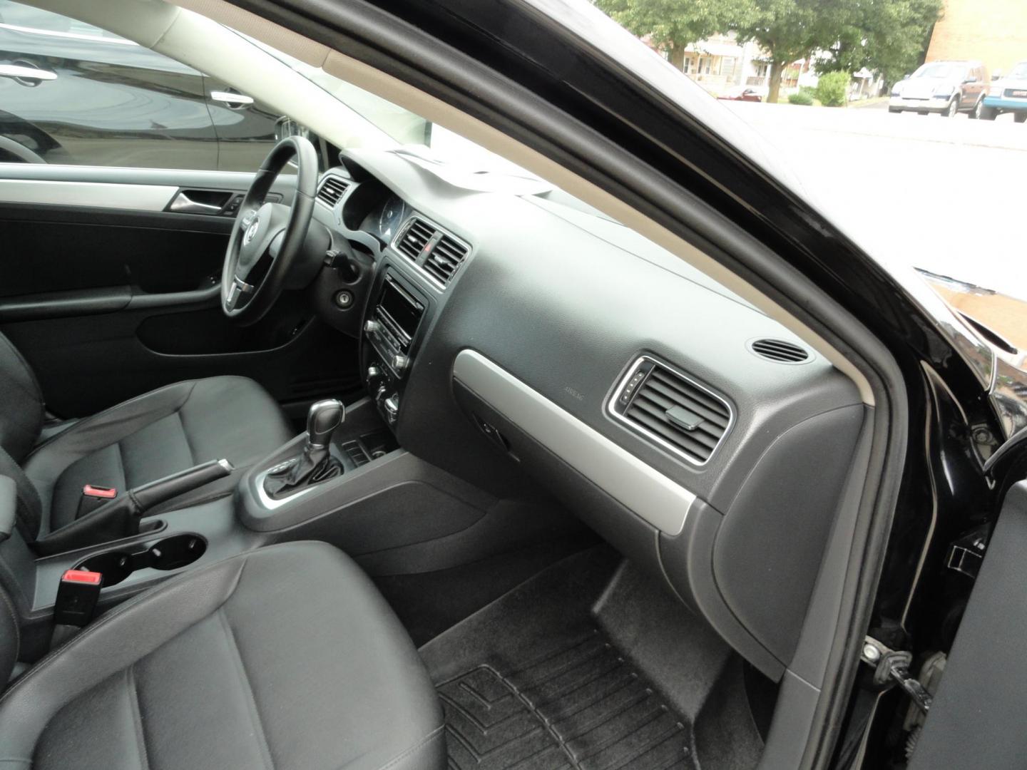 2012 Super Black /Greystone Volkswagen Jetta TDI (3VWLL7AJ2CM) with an 2.0L L4 DOHC 16V TURBO engine, 6-Speed Automatic transmission, located at 827 W 26th Street, Erie, PA, 16508, (814) 455-3401, 42.105431, -80.090942 - Thanks for looking at our two-owner accident and rust-free recent trade in. This is the TDI model which means diesel, leather seating area, heated front seats, keyless entry with both remotes, the factory owners manuals, Weathertech floor mats and lots more. This was a well-kept vehicle by its last - Photo#33