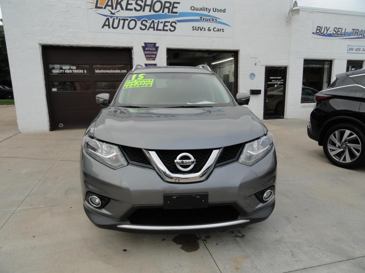 2015 Gun Metallic /Jet Black Nissan Rogue SL (5N1AT2MV1FC) with an 2.5L L4 DOHC 16V engine, Continuously Variable Transmission transmission, located at 827 W 26th Street, Erie, PA, 16508, (814) 455-3401, 42.105431, -80.090942 - Thanks for looking at our own owner, nonsmoker, accident and rust-free new Nissan trade. This is the SL model with all wheel drive, panoramic sunroof, power drivers seat, power lift gate, passive entry, heated front seats, push button start, back up camera with surround cameras, navigation, blind sp - Photo#1