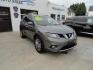 2015 Gun Metallic /Jet Black Nissan Rogue SL (5N1AT2MV1FC) with an 2.5L L4 DOHC 16V engine, Continuously Variable Transmission transmission, located at 827 W 26th Street, Erie, PA, 16508, (814) 455-3401, 42.105431, -80.090942 - Thanks for looking at our own owner, nonsmoker, accident and rust-free new Nissan trade. This is the SL model with all wheel drive, panoramic sunroof, power drivers seat, power lift gate, passive entry, heated front seats, push button start, back up camera with surround cameras, navigation, blind sp - Photo#0