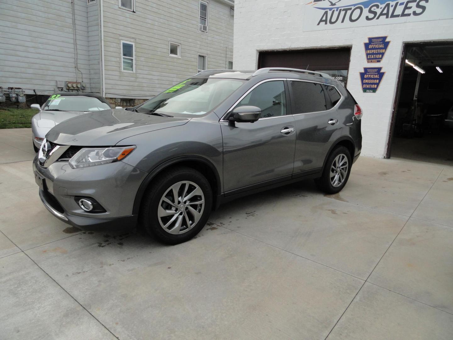 2015 Gun Metallic /Jet Black Nissan Rogue SL (5N1AT2MV1FC) with an 2.5L L4 DOHC 16V engine, Continuously Variable Transmission transmission, located at 827 W 26th Street, Erie, PA, 16508, (814) 455-3401, 42.105431, -80.090942 - Thanks for looking at our own owner, nonsmoker, accident and rust-free new Nissan trade. This is the SL model with all wheel drive, panoramic sunroof, power drivers seat, power lift gate, passive entry, heated front seats, push button start, back up camera with surround cameras, navigation, blind sp - Photo#6