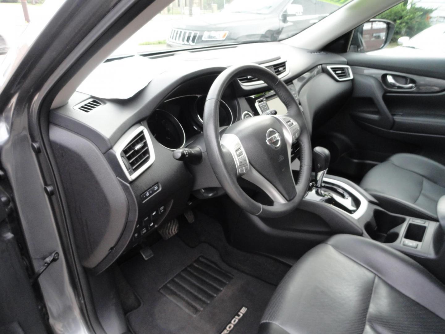 2015 Gun Metallic /Jet Black Nissan Rogue SL (5N1AT2MV1FC) with an 2.5L L4 DOHC 16V engine, Continuously Variable Transmission transmission, located at 827 W 26th Street, Erie, PA, 16508, (814) 455-3401, 42.105431, -80.090942 - Thanks for looking at our own owner, nonsmoker, accident and rust-free new Nissan trade. This is the SL model with all wheel drive, panoramic sunroof, power drivers seat, power lift gate, passive entry, heated front seats, push button start, back up camera with surround cameras, navigation, blind sp - Photo#9