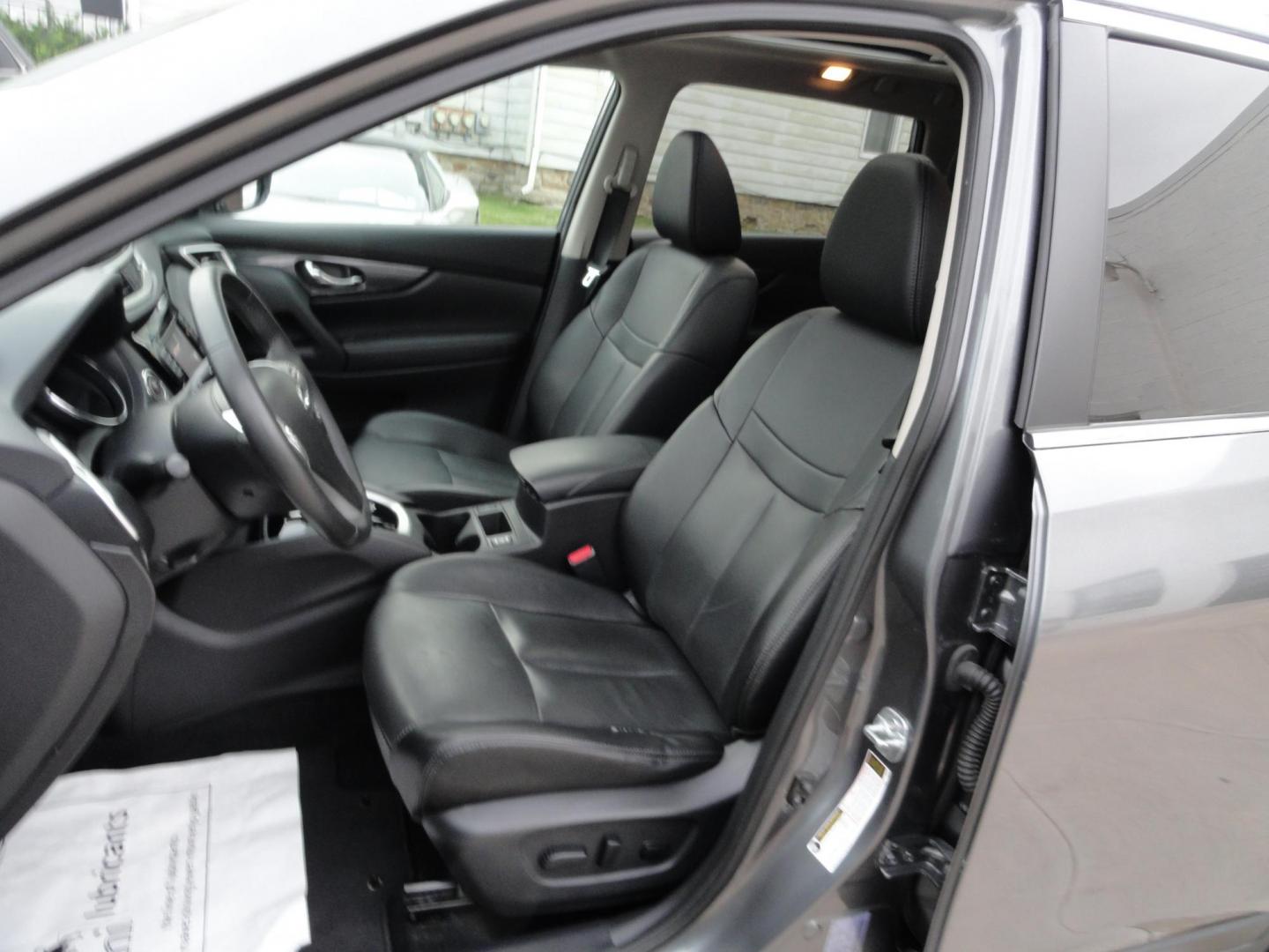 2015 Gun Metallic /Jet Black Nissan Rogue SL (5N1AT2MV1FC) with an 2.5L L4 DOHC 16V engine, Continuously Variable Transmission transmission, located at 827 W 26th Street, Erie, PA, 16508, (814) 455-3401, 42.105431, -80.090942 - Thanks for looking at our own owner, nonsmoker, accident and rust-free new Nissan trade. This is the SL model with all wheel drive, panoramic sunroof, power drivers seat, power lift gate, passive entry, heated front seats, push button start, back up camera with surround cameras, navigation, blind sp - Photo#23