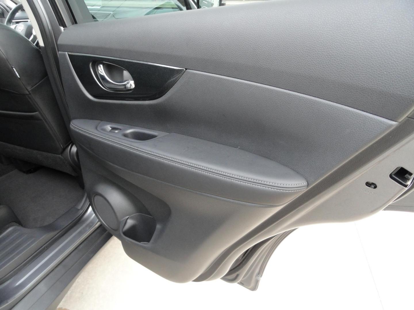 2015 Gun Metallic /Jet Black Nissan Rogue SL (5N1AT2MV1FC) with an 2.5L L4 DOHC 16V engine, Continuously Variable Transmission transmission, located at 827 W 26th Street, Erie, PA, 16508, (814) 455-3401, 42.105431, -80.090942 - Thanks for looking at our own owner, nonsmoker, accident and rust-free new Nissan trade. This is the SL model with all wheel drive, panoramic sunroof, power drivers seat, power lift gate, passive entry, heated front seats, push button start, back up camera with surround cameras, navigation, blind sp - Photo#35