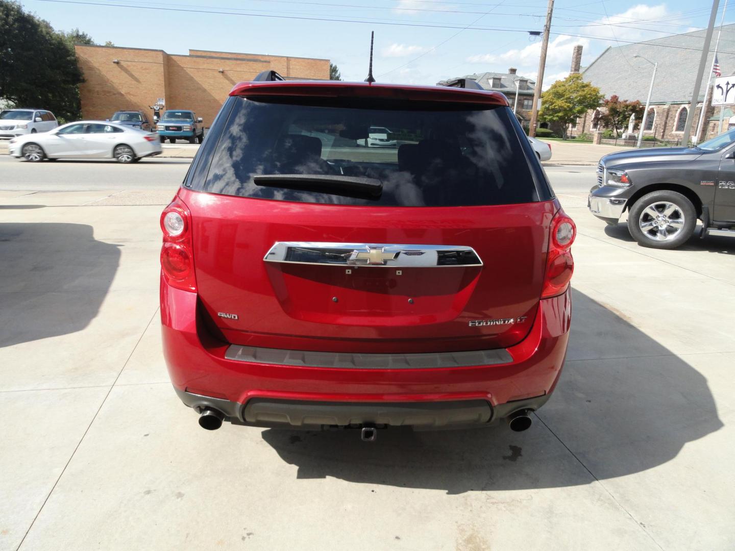 2014 Crystal Red Metallic /Greystone Chevrolet Equinox 1LT (2GNFLFE30E6) with an 3.6L V6 DOHC 24V engine, 6-Speed Automatic transmission, located at 827 W 26th Street, Erie, PA, 16508, (814) 455-3401, 42.105431, -80.090942 - Thanks for looking at our one owner, nonsmoker, low mileage accident-free new Chevrolet trade. This is the LT model with all wheel drive, the 3.6 six-cylinder engine, power drivers seat, pioneer stereo, remote start, back up camera and lots more including two remotes with the keys, the factory floor - Photo#4