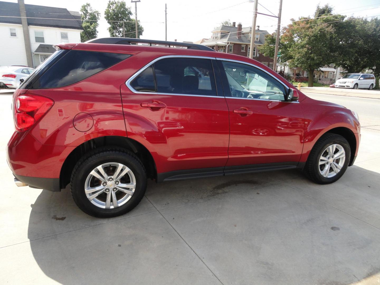 2014 Crystal Red Metallic /Greystone Chevrolet Equinox 1LT (2GNFLFE30E6) with an 3.6L V6 DOHC 24V engine, 6-Speed Automatic transmission, located at 827 W 26th Street, Erie, PA, 16508, (814) 455-3401, 42.105431, -80.090942 - Thanks for looking at our one owner, nonsmoker, low mileage accident-free new Chevrolet trade. This is the LT model with all wheel drive, the 3.6 six-cylinder engine, power drivers seat, pioneer stereo, remote start, back up camera and lots more including two remotes with the keys, the factory floor - Photo#3