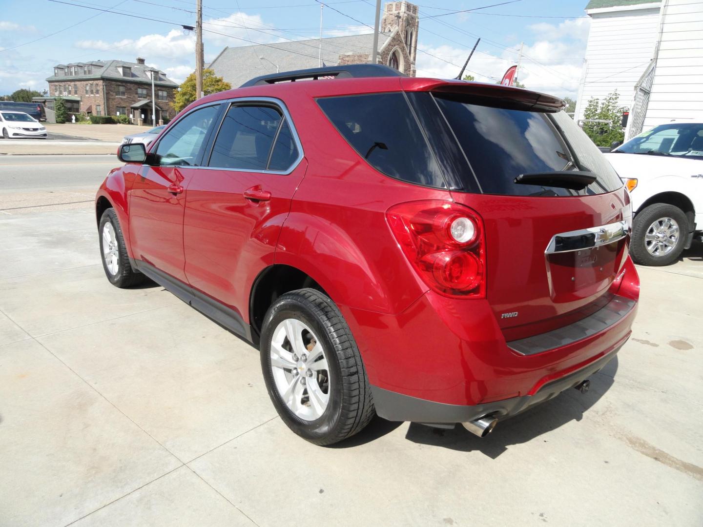 2014 Crystal Red Metallic /Greystone Chevrolet Equinox 1LT (2GNFLFE30E6) with an 3.6L V6 DOHC 24V engine, 6-Speed Automatic transmission, located at 827 W 26th Street, Erie, PA, 16508, (814) 455-3401, 42.105431, -80.090942 - Thanks for looking at our one owner, nonsmoker, low mileage accident-free new Chevrolet trade. This is the LT model with all wheel drive, the 3.6 six-cylinder engine, power drivers seat, pioneer stereo, remote start, back up camera and lots more including two remotes with the keys, the factory floor - Photo#5