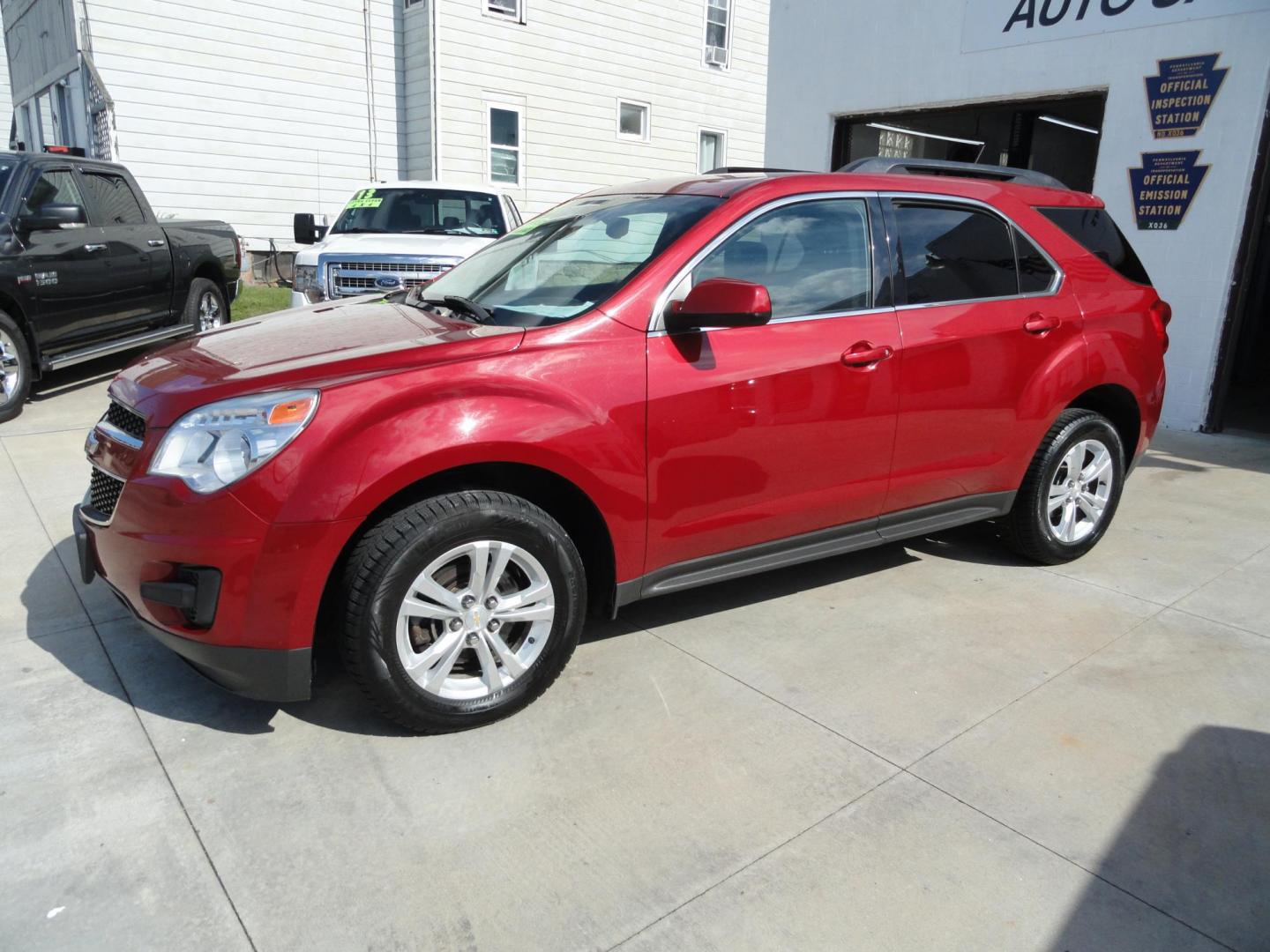 2014 Crystal Red Metallic /Greystone Chevrolet Equinox 1LT (2GNFLFE30E6) with an 3.6L V6 DOHC 24V engine, 6-Speed Automatic transmission, located at 827 W 26th Street, Erie, PA, 16508, (814) 455-3401, 42.105431, -80.090942 - Thanks for looking at our one owner, nonsmoker, low mileage accident-free new Chevrolet trade. This is the LT model with all wheel drive, the 3.6 six-cylinder engine, power drivers seat, pioneer stereo, remote start, back up camera and lots more including two remotes with the keys, the factory floor - Photo#6