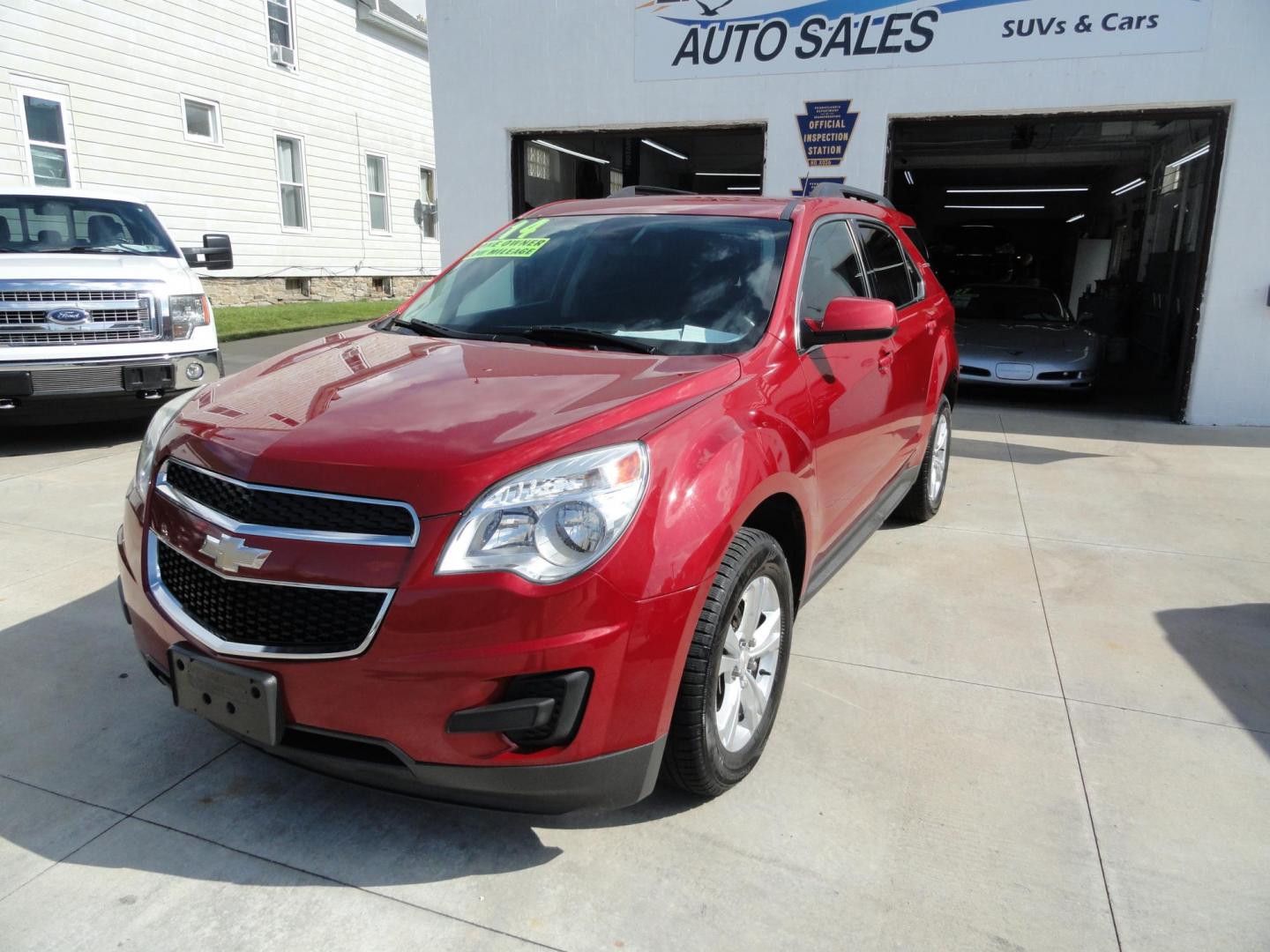 2014 Crystal Red Metallic /Greystone Chevrolet Equinox 1LT (2GNFLFE30E6) with an 3.6L V6 DOHC 24V engine, 6-Speed Automatic transmission, located at 827 W 26th Street, Erie, PA, 16508, (814) 455-3401, 42.105431, -80.090942 - Thanks for looking at our one owner, nonsmoker, low mileage accident-free new Chevrolet trade. This is the LT model with all wheel drive, the 3.6 six-cylinder engine, power drivers seat, pioneer stereo, remote start, back up camera and lots more including two remotes with the keys, the factory floor - Photo#7
