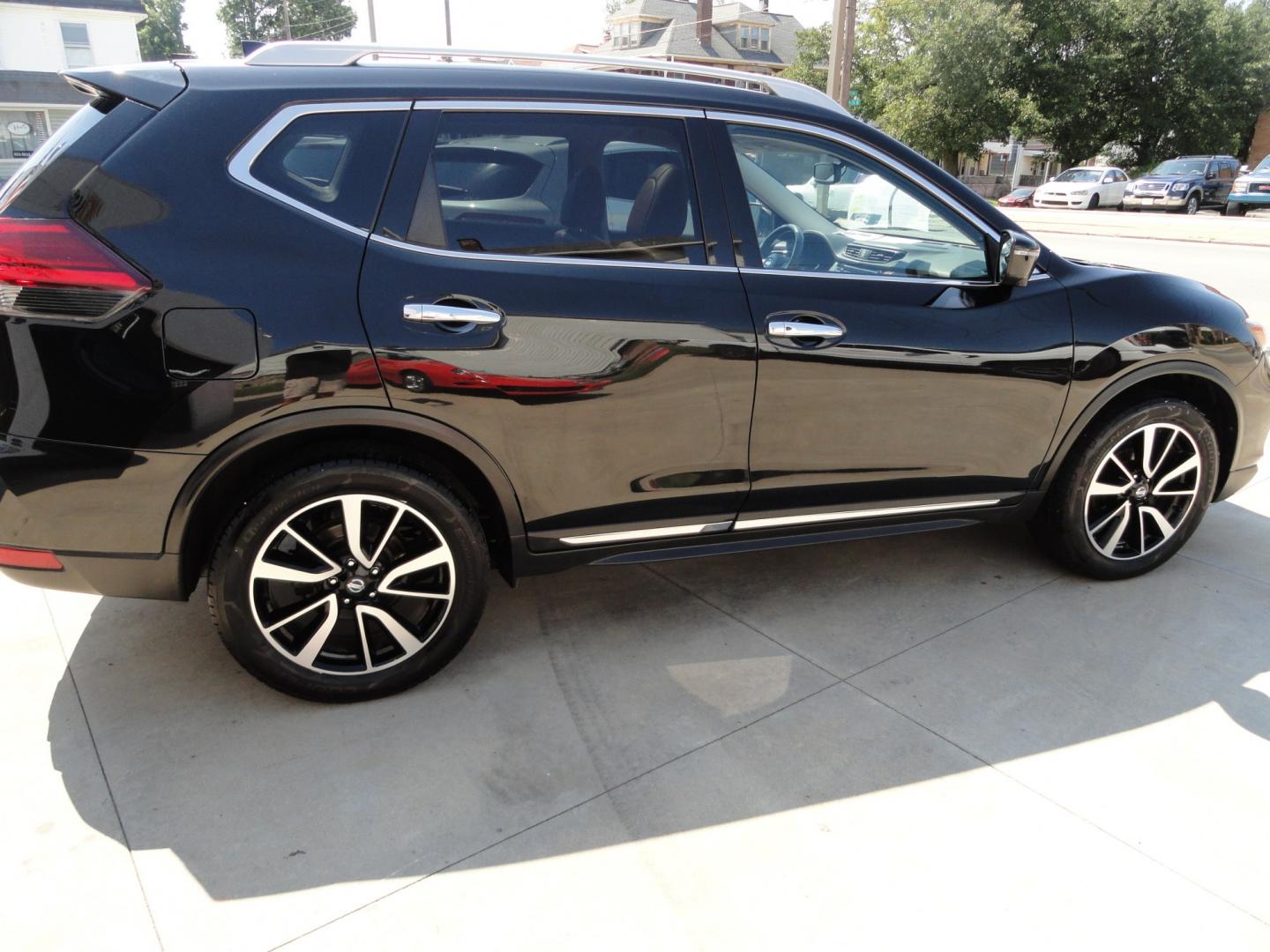 2017 Black Onyx /Two Tone Nissan Rogue SL (5N1AT2MV1HC) with an 2.5L L4 DOHC 16V engine, CVT transmission, located at 827 W 26th Street, Erie, PA, 16508, (814) 455-3401, 42.105431, -80.090942 - Thanks for looking at two owner accident-free new arrival that we sold back in October to a good friend and unfortunately, he passed away suddenly and only put 183 miles on this vehicle which we purchased back from his family. This is the SL all-wheel drive model with every option in that model incl- Photo#3