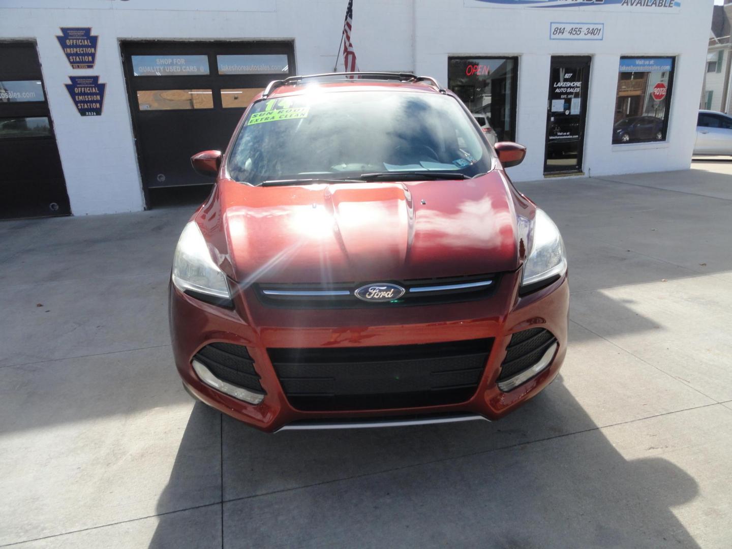 2014 Sunset Metallic /Greystone Ford Escape SE 4WD (1FMCU9GX3EU) with an 1.6L L4 DOHC 16V engine, 6-Speed Automatic transmission, located at 827 W 26th Street, Erie, PA, 16508, (814) 455-3401, 42.105431, -80.090942 - Thanks for looking at out two owner accident and rust-free new arrival. This is the SE model with all wheel drive, power drivers sear, panoramic sunroof, rear parking aids, back up camera, large touch screen and lots more. A full service was just completed in our service department with new Pa state - Photo#1