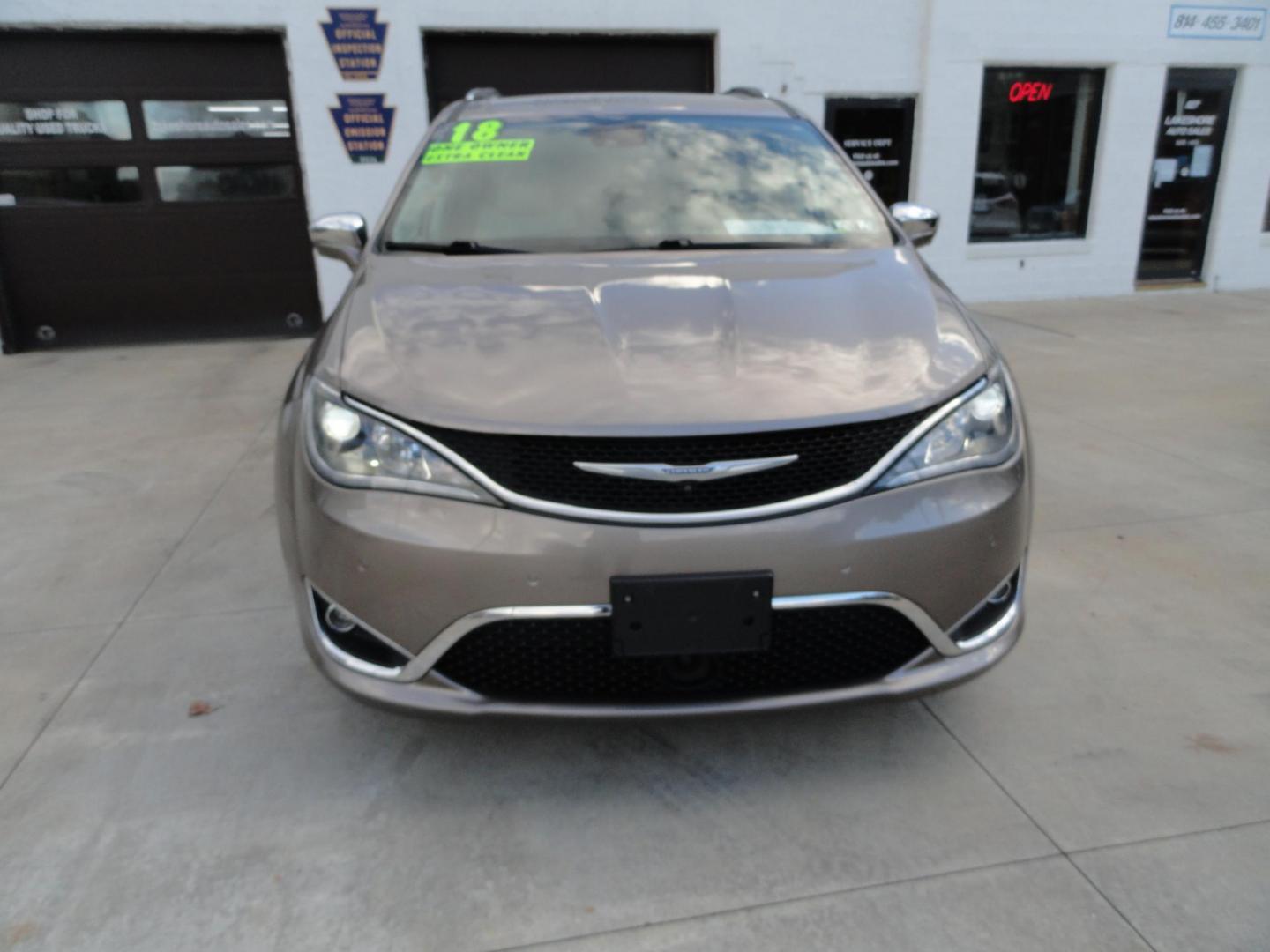 2018 Light Toffee Silver Metallic /Toffee/Cognac/Alloy Chrysler Pacifica Limited (2C4RC1GG3JR) with an 3.6L V6 DOHC 24V engine, 9 Speed Automatic transmission, located at 827 W 26th Street, Erie, PA, 16508, (814) 455-3401, 42.105431, -80.090942 - Thanks for looking at our one owner accident-free new arrival. This is the Limited model with eight passenger seating and lots of options including heated and cooled seats, remote start, stow and go, navigation with back up camera, surround cameras, rear entertainment, blind spot monitor, lane depar - Photo#1