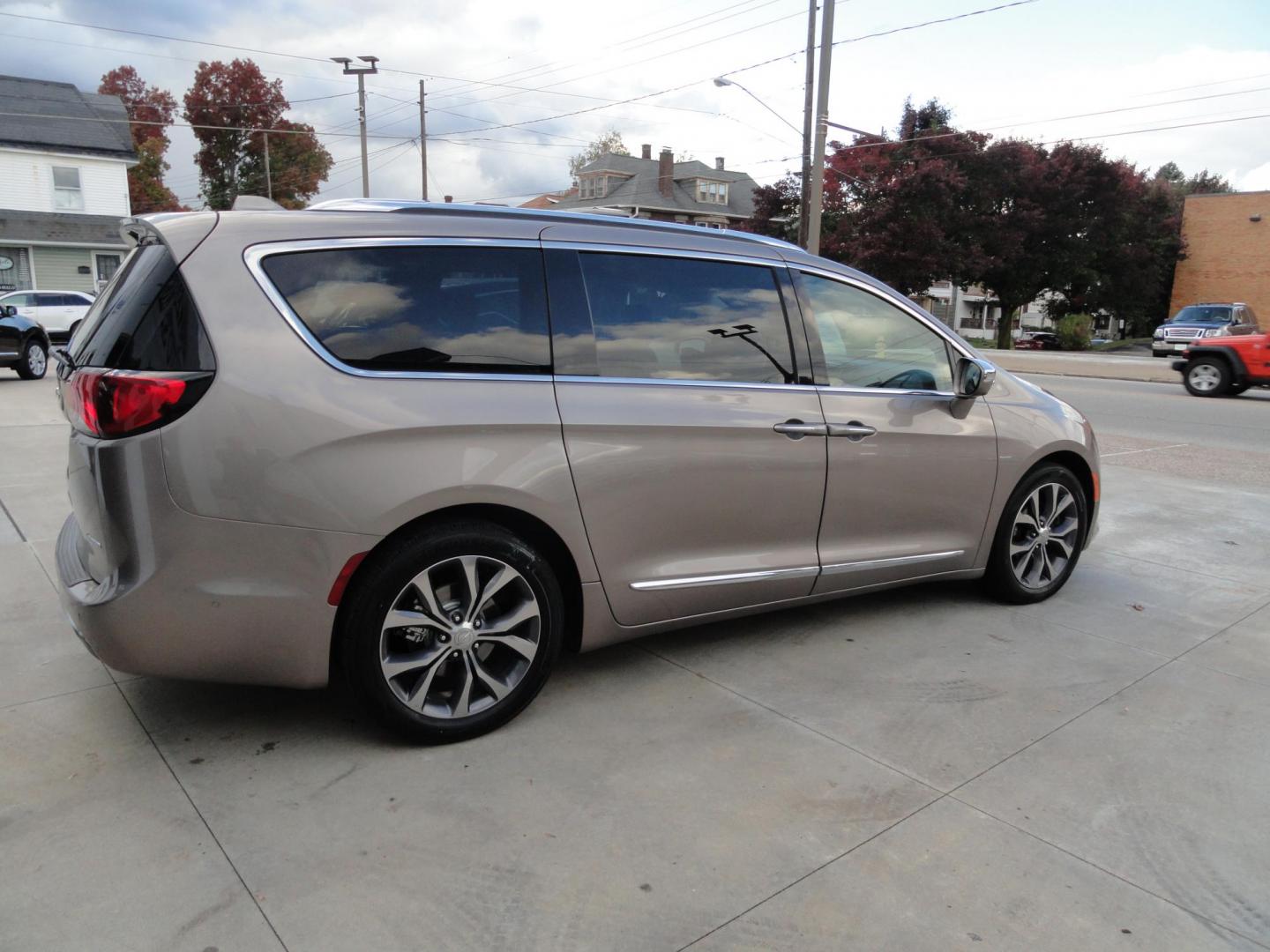 2018 Light Toffee Silver Metallic /Toffee/Cognac/Alloy Chrysler Pacifica Limited (2C4RC1GG3JR) with an 3.6L V6 DOHC 24V engine, 9 Speed Automatic transmission, located at 827 W 26th Street, Erie, PA, 16508, (814) 455-3401, 42.105431, -80.090942 - Thanks for looking at our one owner accident-free new arrival. This is the Limited model with eight passenger seating and lots of options including heated and cooled seats, remote start, stow and go, navigation with back up camera, surround cameras, rear entertainment, blind spot monitor, lane depar - Photo#3