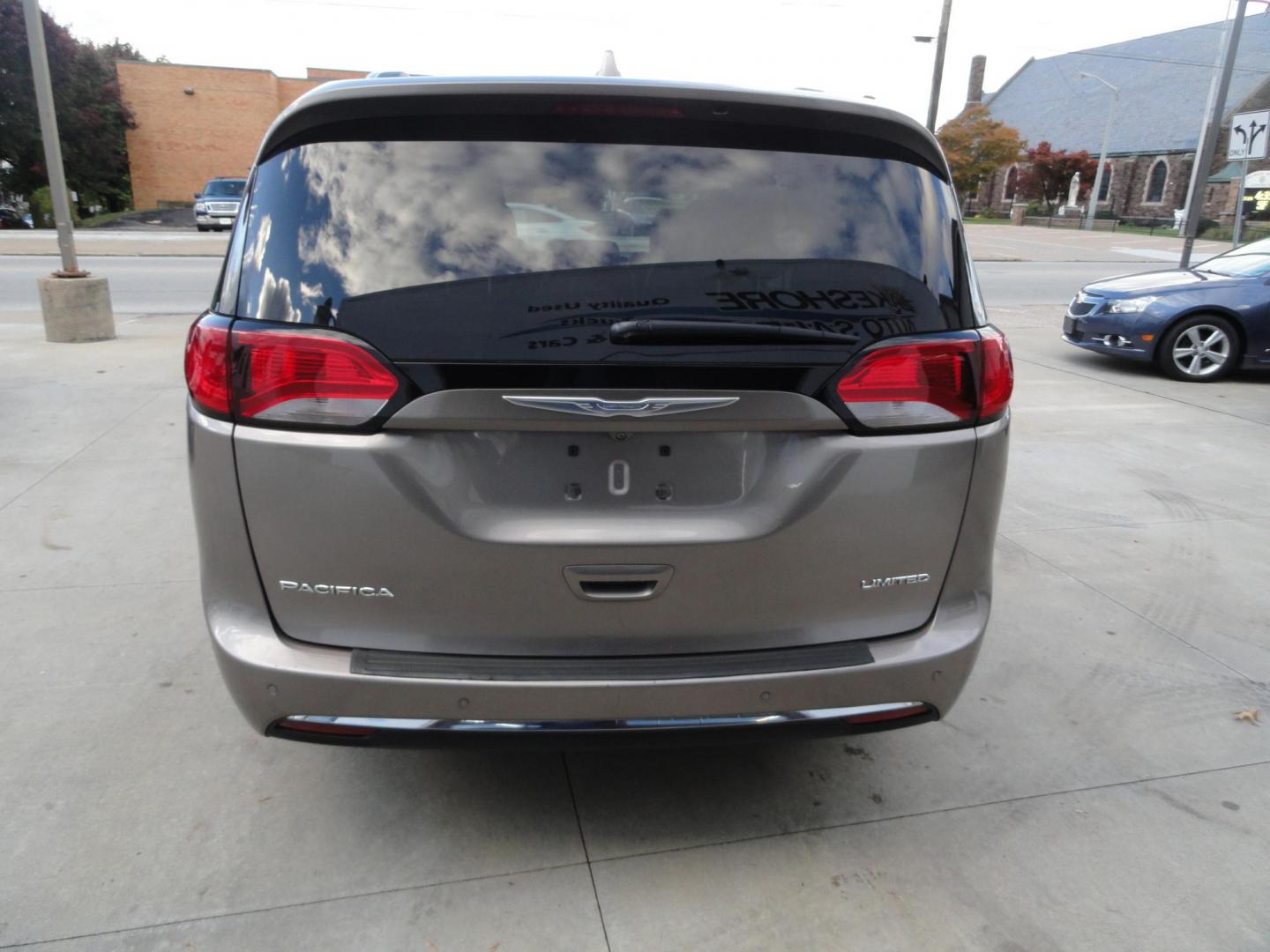 2018 Light Toffee Silver Metallic /Toffee/Cognac/Alloy Chrysler Pacifica Limited (2C4RC1GG3JR) with an 3.6L V6 DOHC 24V engine, 9 Speed Automatic transmission, located at 827 W 26th Street, Erie, PA, 16508, (814) 455-3401, 42.105431, -80.090942 - Thanks for looking at our one owner accident-free new arrival. This is the Limited model with eight passenger seating and lots of options including heated and cooled seats, remote start, stow and go, navigation with back up camera, surround cameras, rear entertainment, blind spot monitor, lane depar - Photo#4