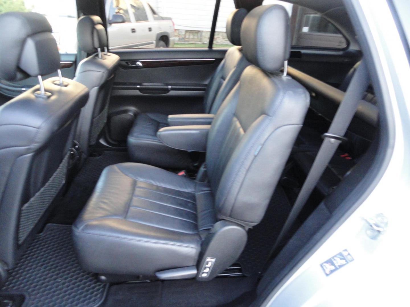 2010 Iridium Silver Metallic /Black Mercedes-Benz R-Class R350 4MATIC w/ 3rd Row (4JGCB6FE1AA) with an 3.5L V6 DOHC 24V engine, 7-Speed Automatic transmission, located at 827 W 26th Street, Erie, PA, 16508, (814) 455-3401, 42.105431, -80.090942 - Thanks for looking at our super clean, low mileage rust free and accident-free recent arrival. This is the R350 4Matic 7 passenger with heated leather seats, panoramic sunroof, back up camera, navigation, both remotes and keys, the factory owners' manuals and factory floor mats. A recent service was - Photo#28