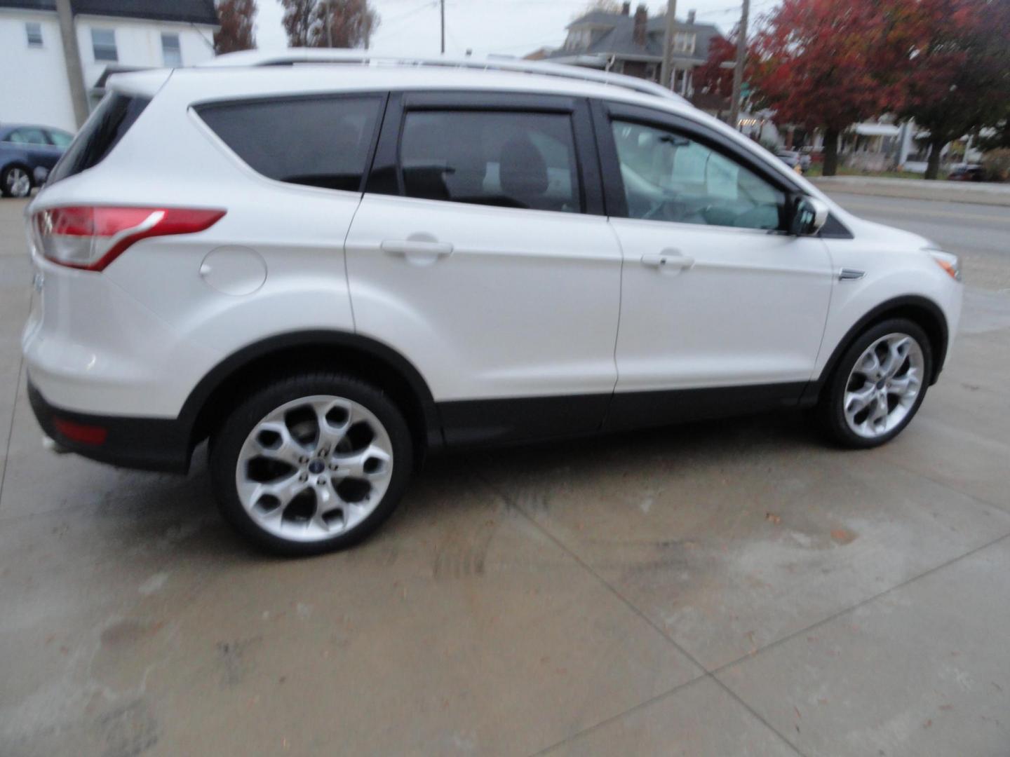 2015 White Platinum Tricoat /Tan Ford Escape Titanium 4WD (1FMCU9J94FU) with an 2.0L L4 DOHC 16V engine, 6-Speed Automatic transmission, located at 827 W 26th Street, Erie, PA, 16508, (814) 455-3401, 42.105431, -80.090942 - Photo#3