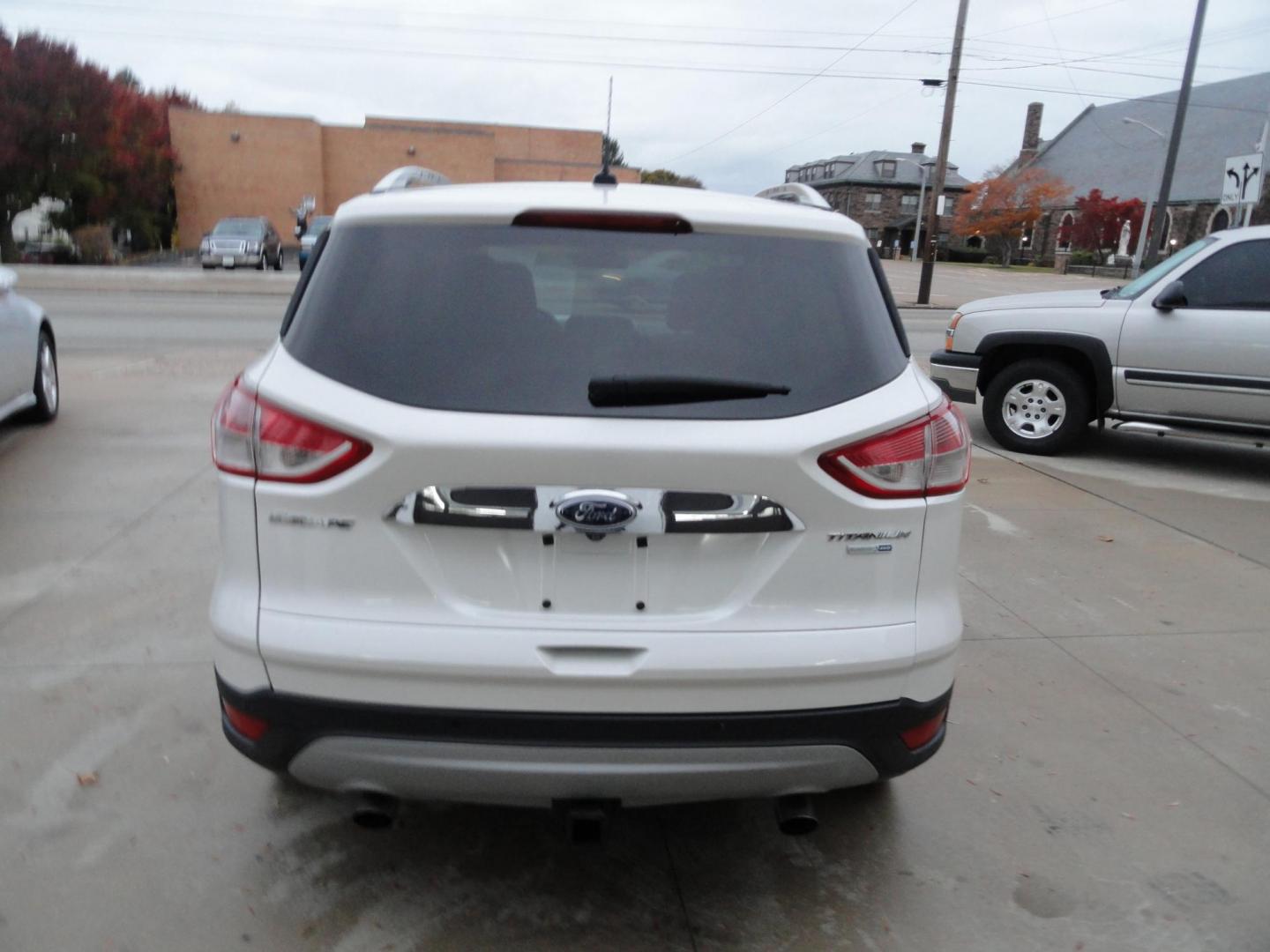 2015 White Platinum Tricoat /Tan Ford Escape Titanium 4WD (1FMCU9J94FU) with an 2.0L L4 DOHC 16V engine, 6-Speed Automatic transmission, located at 827 W 26th Street, Erie, PA, 16508, (814) 455-3401, 42.105431, -80.090942 - Photo#4