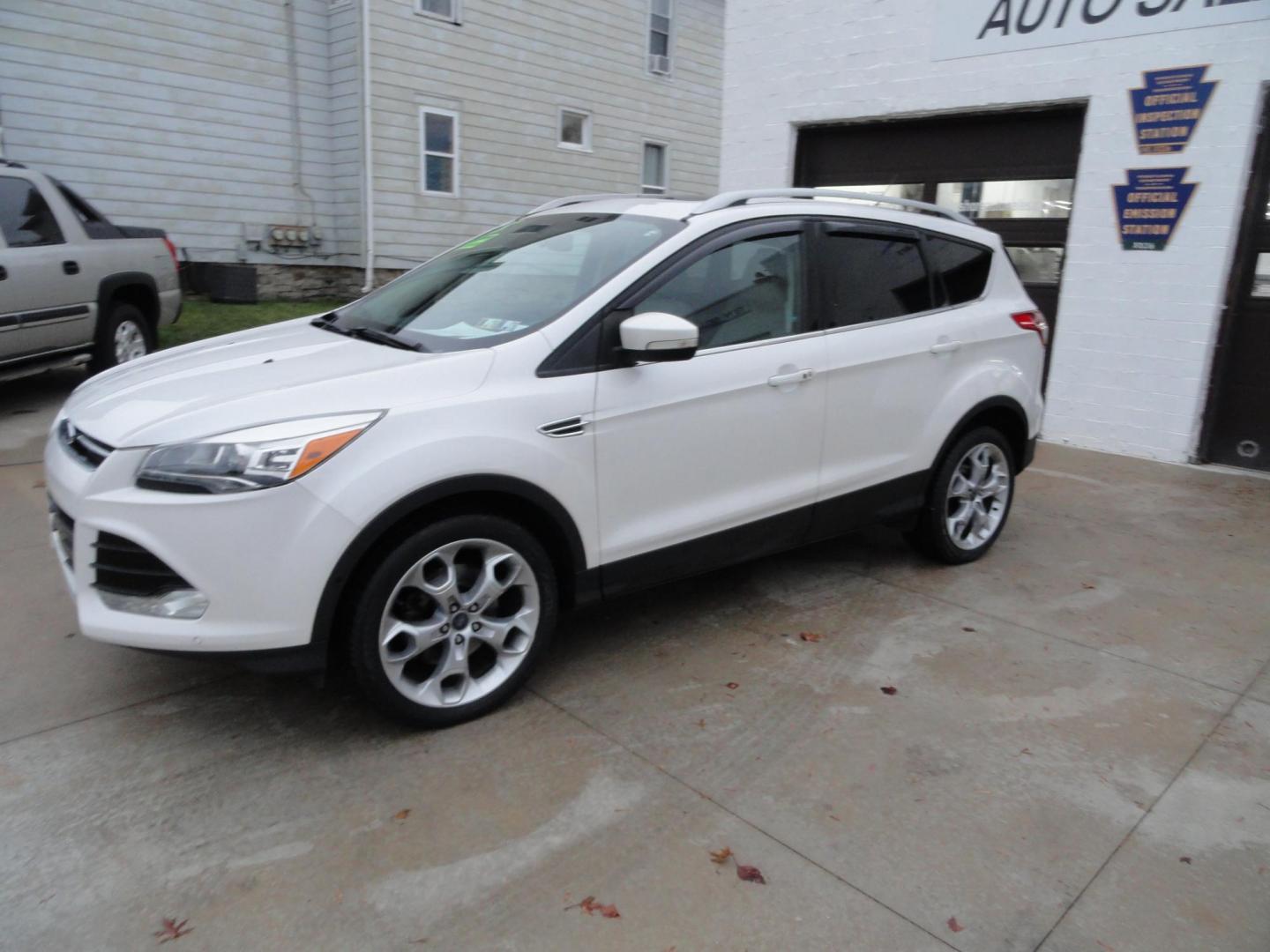 2015 White Platinum Tricoat /Tan Ford Escape Titanium 4WD (1FMCU9J94FU) with an 2.0L L4 DOHC 16V engine, 6-Speed Automatic transmission, located at 827 W 26th Street, Erie, PA, 16508, (814) 455-3401, 42.105431, -80.090942 - Photo#6