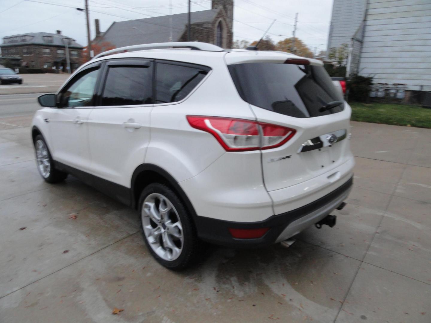 2015 White Platinum Tricoat /Tan Ford Escape Titanium 4WD (1FMCU9J94FU) with an 2.0L L4 DOHC 16V engine, 6-Speed Automatic transmission, located at 827 W 26th Street, Erie, PA, 16508, (814) 455-3401, 42.105431, -80.090942 - Photo#5