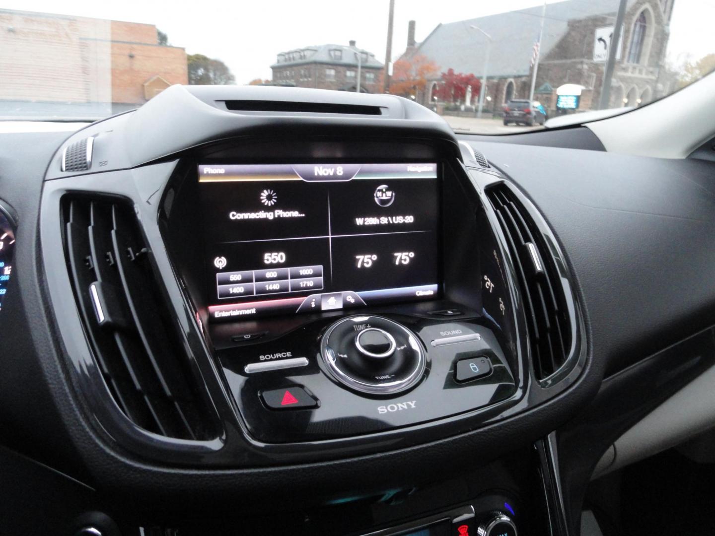 2015 White Platinum Tricoat /Tan Ford Escape Titanium 4WD (1FMCU9J94FU) with an 2.0L L4 DOHC 16V engine, 6-Speed Automatic transmission, located at 827 W 26th Street, Erie, PA, 16508, (814) 455-3401, 42.105431, -80.090942 - Photo#10