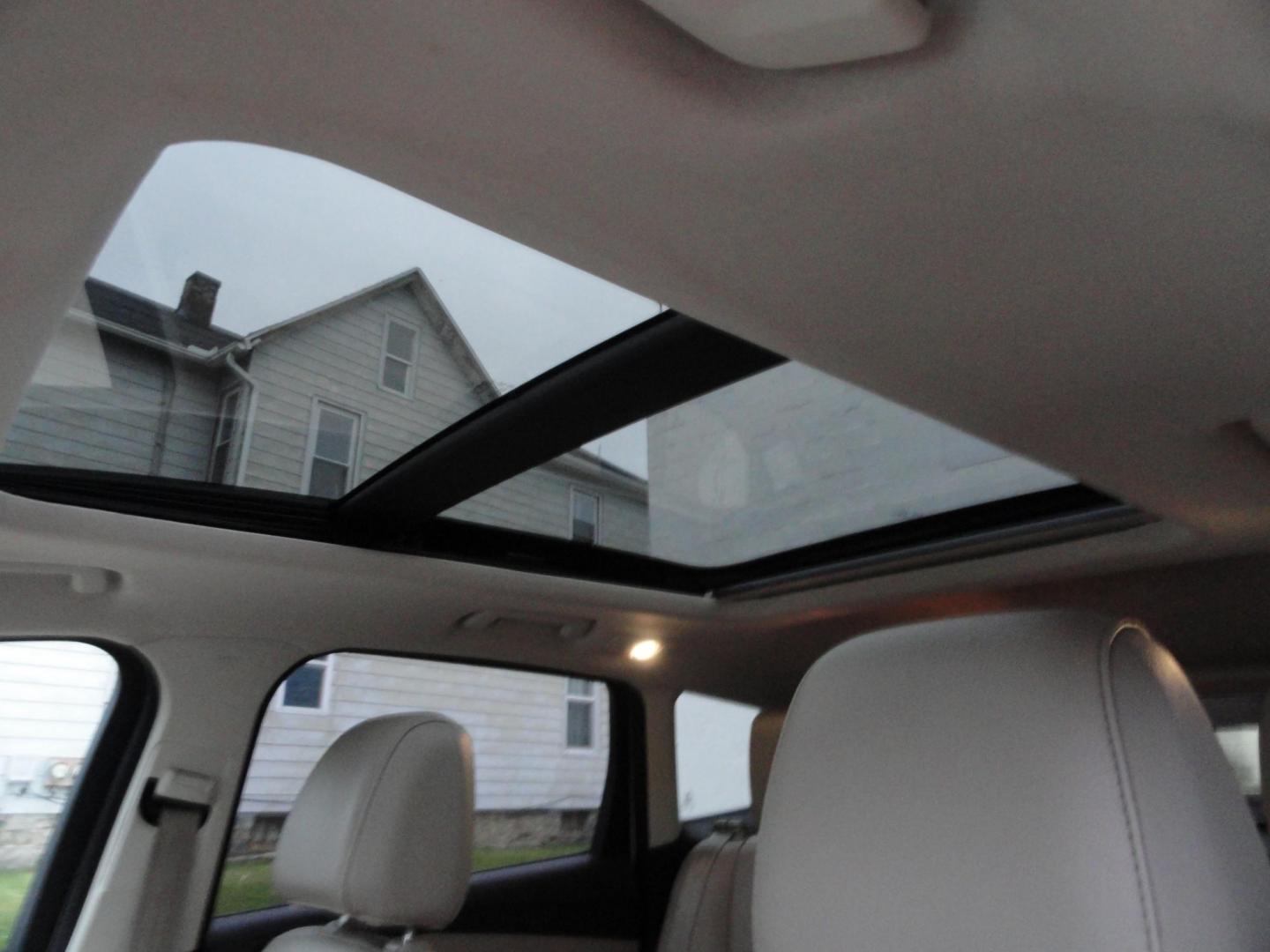 2015 White Platinum Tricoat /Tan Ford Escape Titanium 4WD (1FMCU9J94FU) with an 2.0L L4 DOHC 16V engine, 6-Speed Automatic transmission, located at 827 W 26th Street, Erie, PA, 16508, (814) 455-3401, 42.105431, -80.090942 - Photo#28